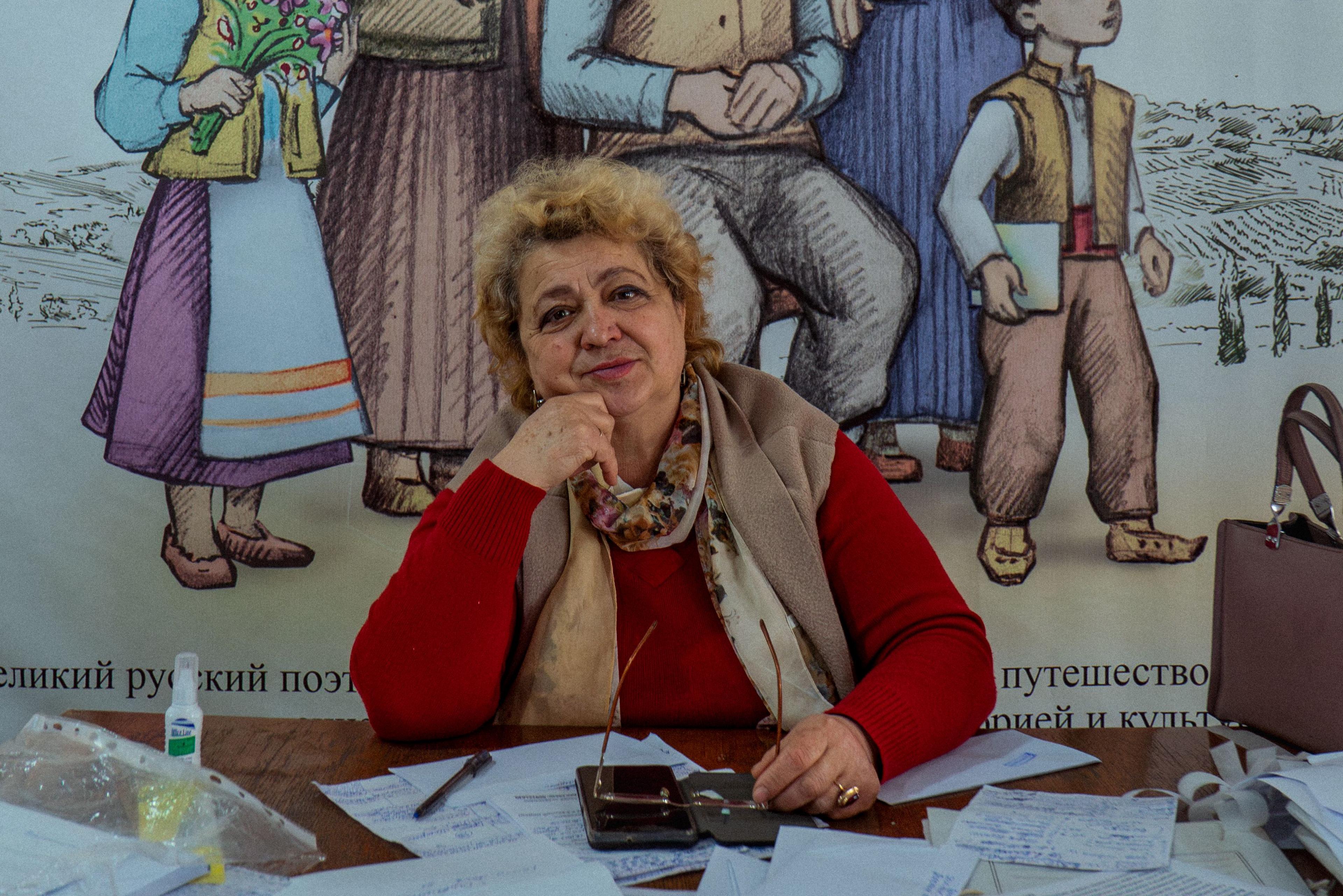 A woman at a desk