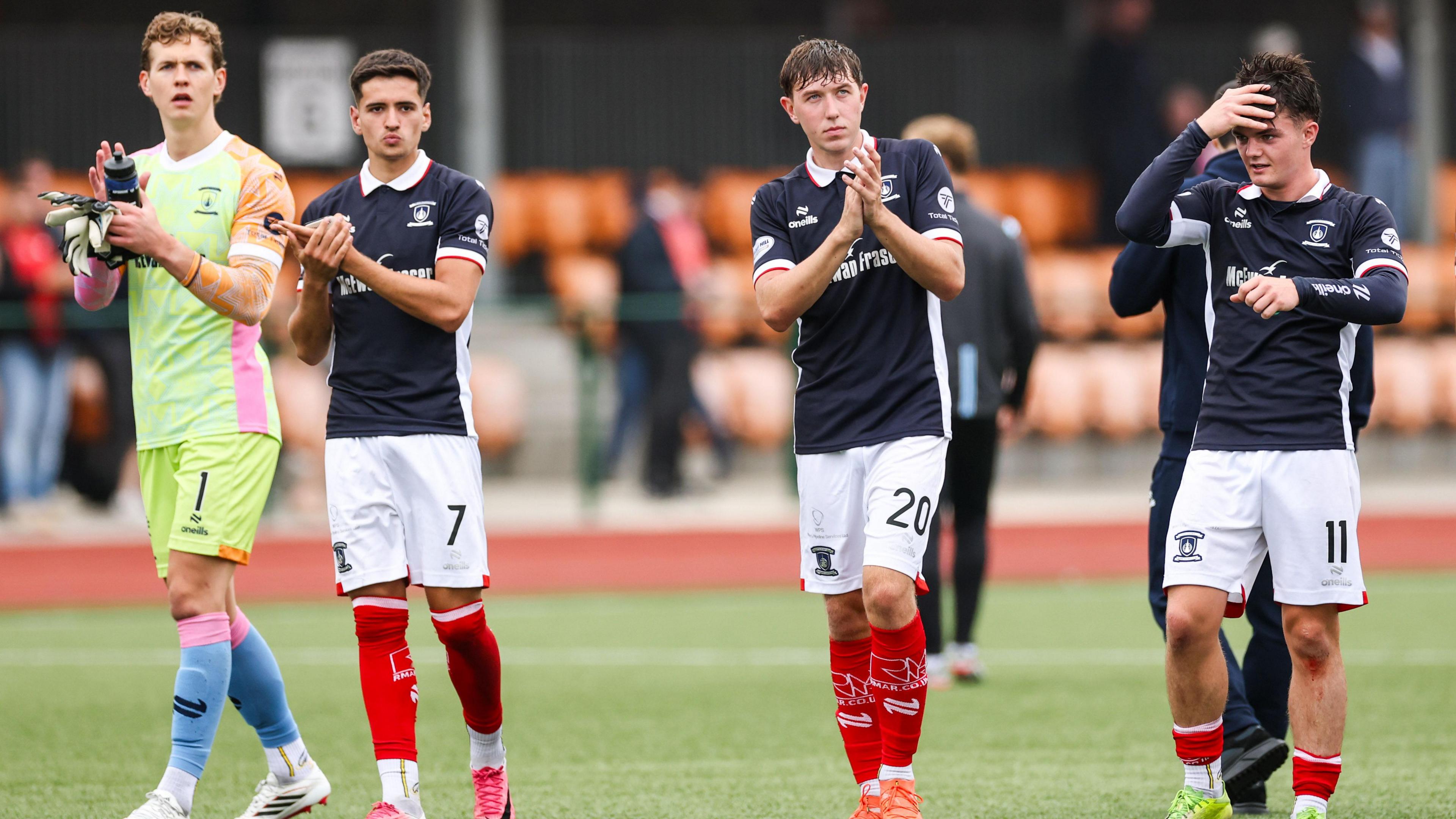 Falkirk players celebrate Saturday's Premier Sports Cup win over 