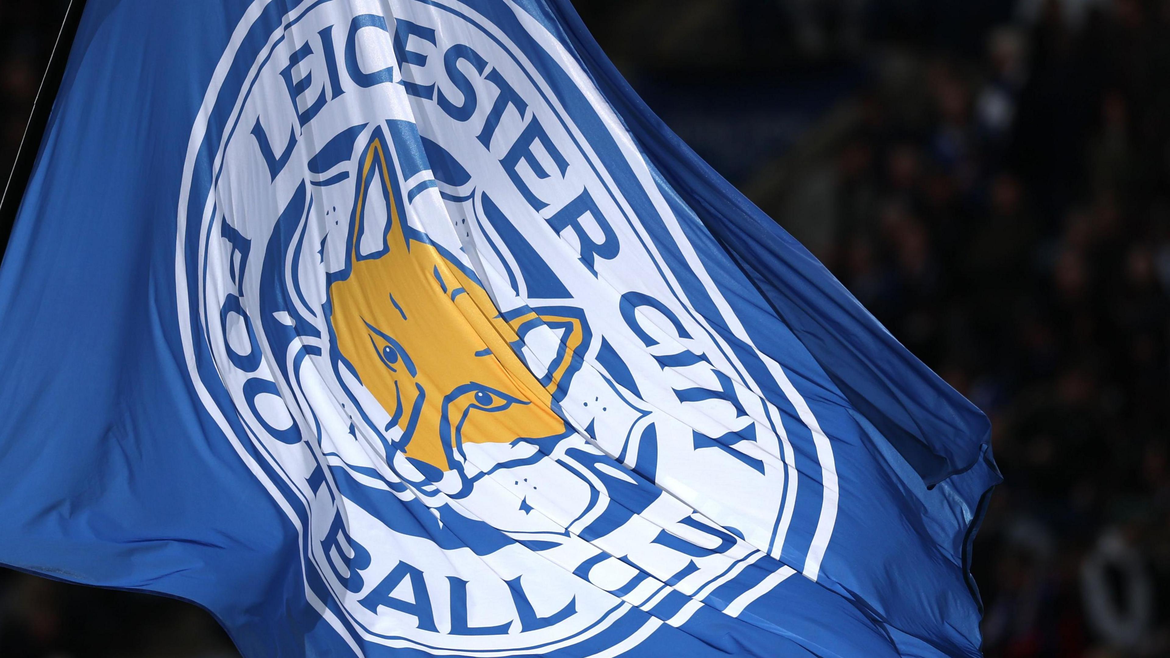 A flag with the Leicester City logo on it