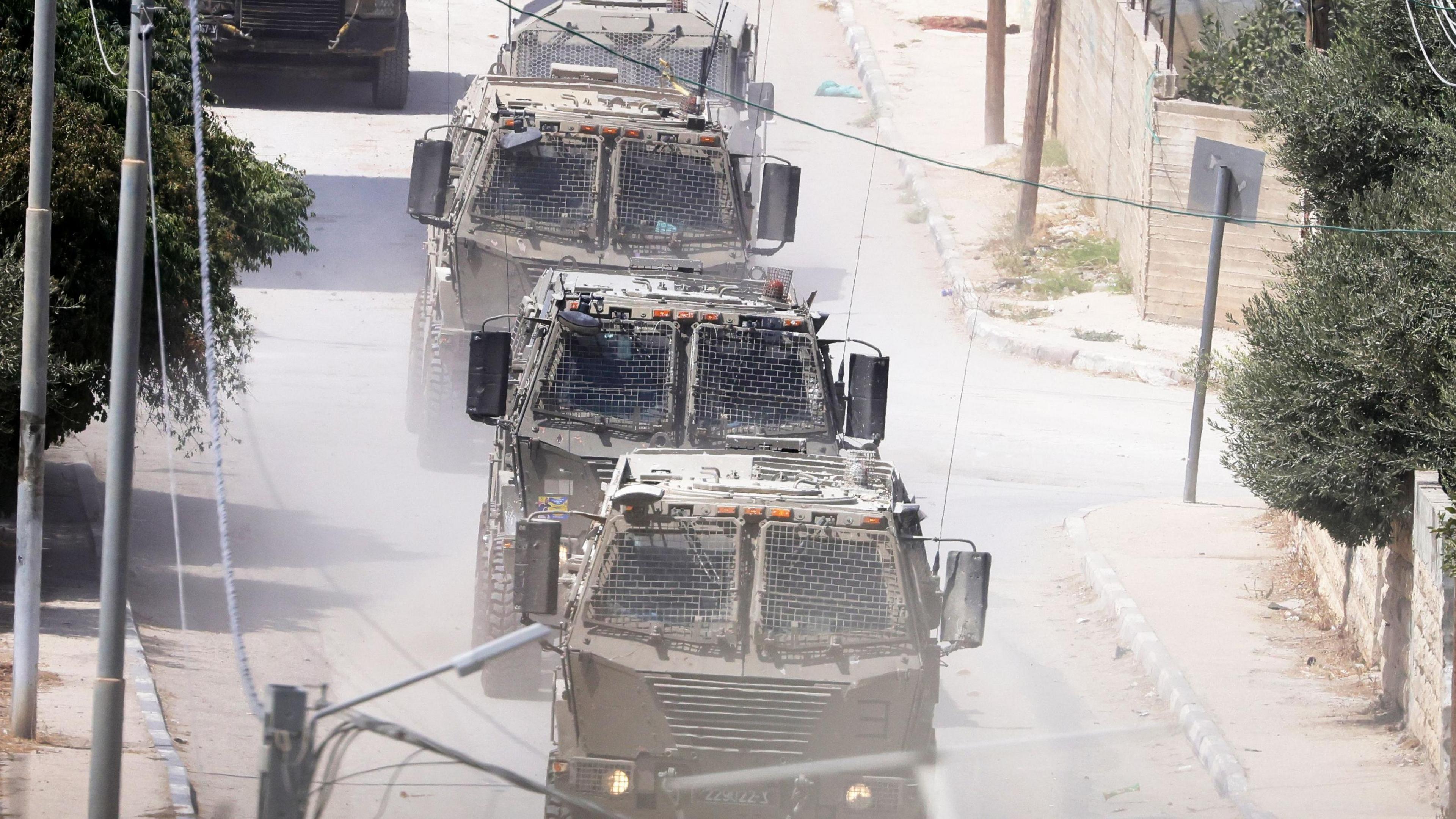 Israeli troops move inside the Jenin refugee camp on the fourth day of an operation in Jenin, 31 August 2024