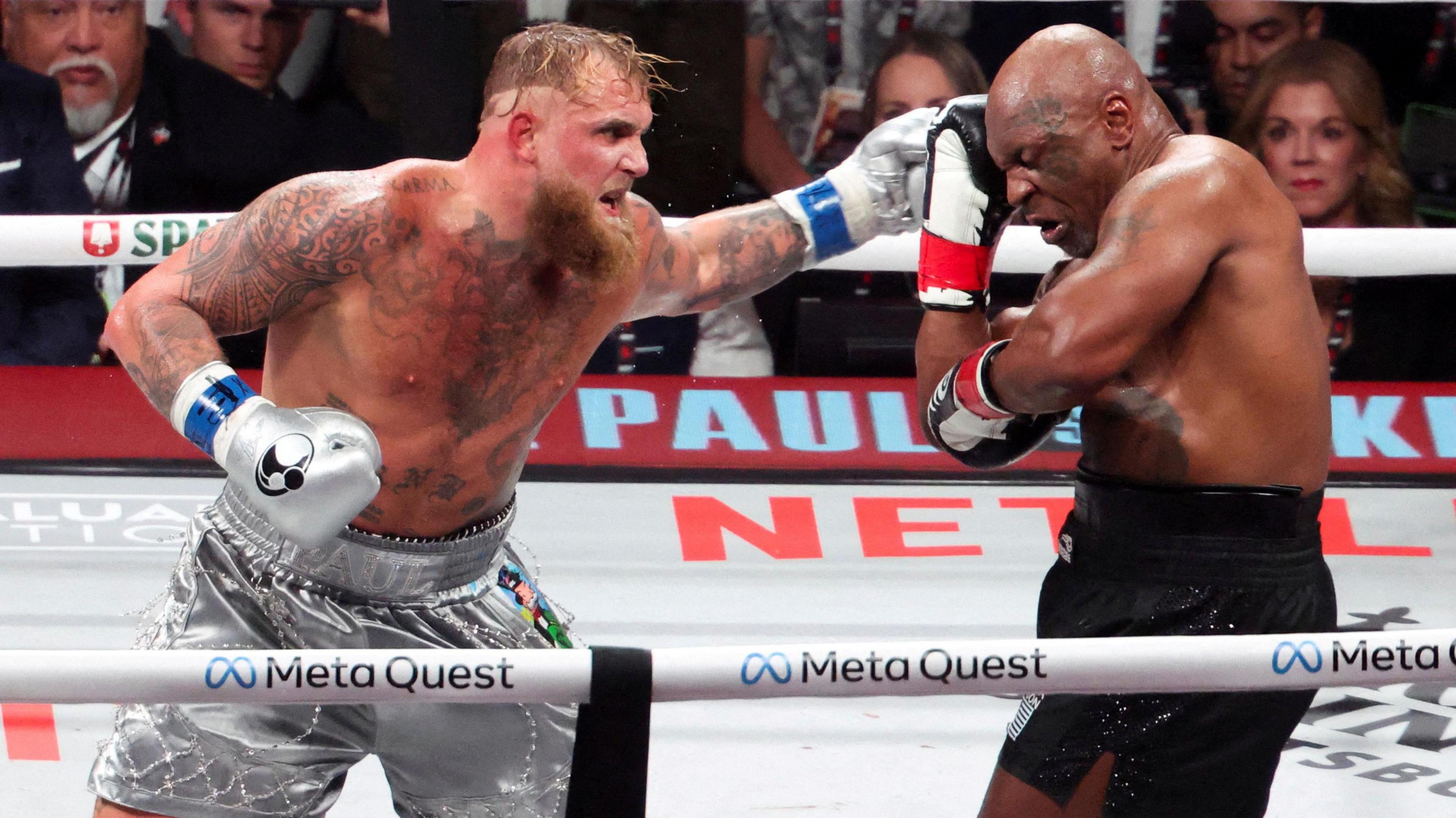 Jake Paul throws a punch during his fight with Mike Tyson