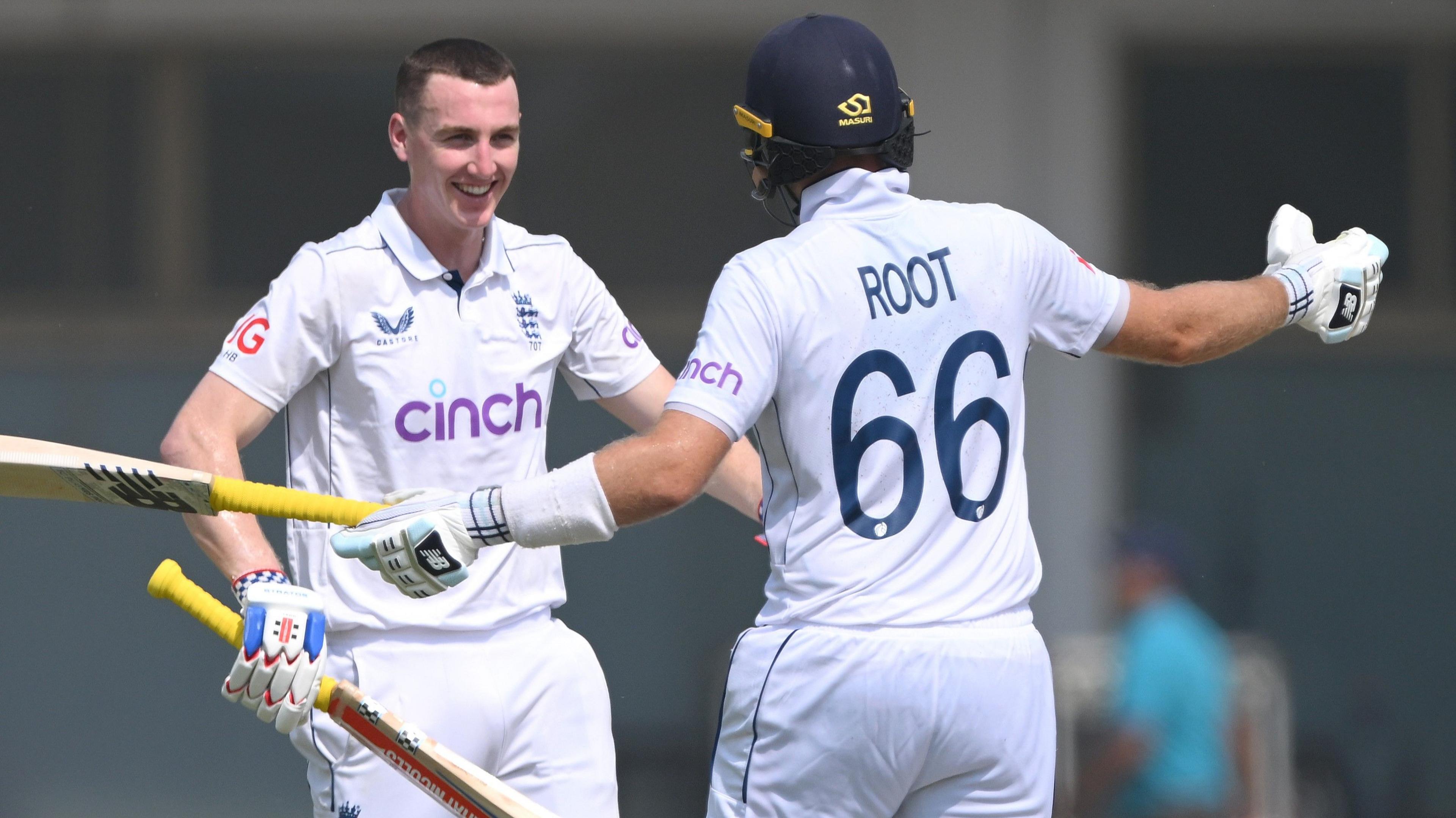 Joe Root and Harry Brook embrace