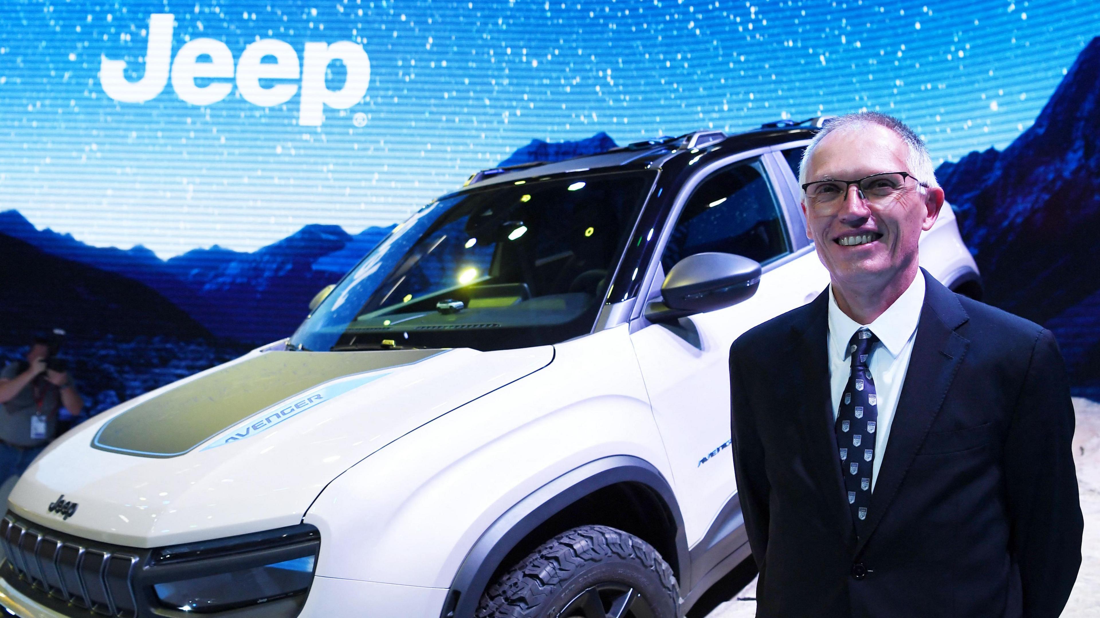 Then-CEO of Stellantis Carlos Tavares poses following the presentation of the Jeep Avenger 4Xe Concept, on the first day of the 2022 Paris auto show on 17 October, 2022.