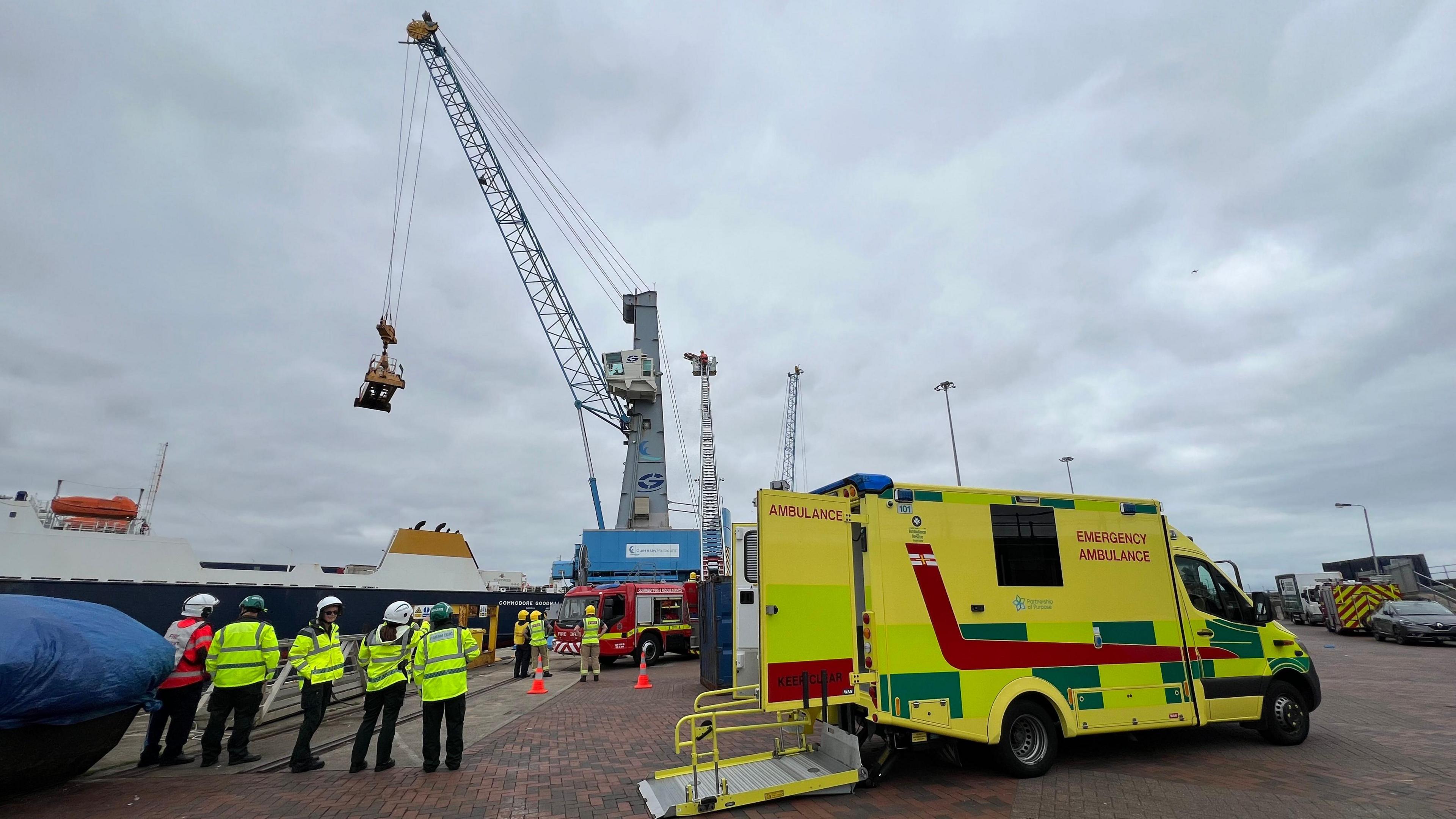 A crane, ambulance and fire engine during the exercise 