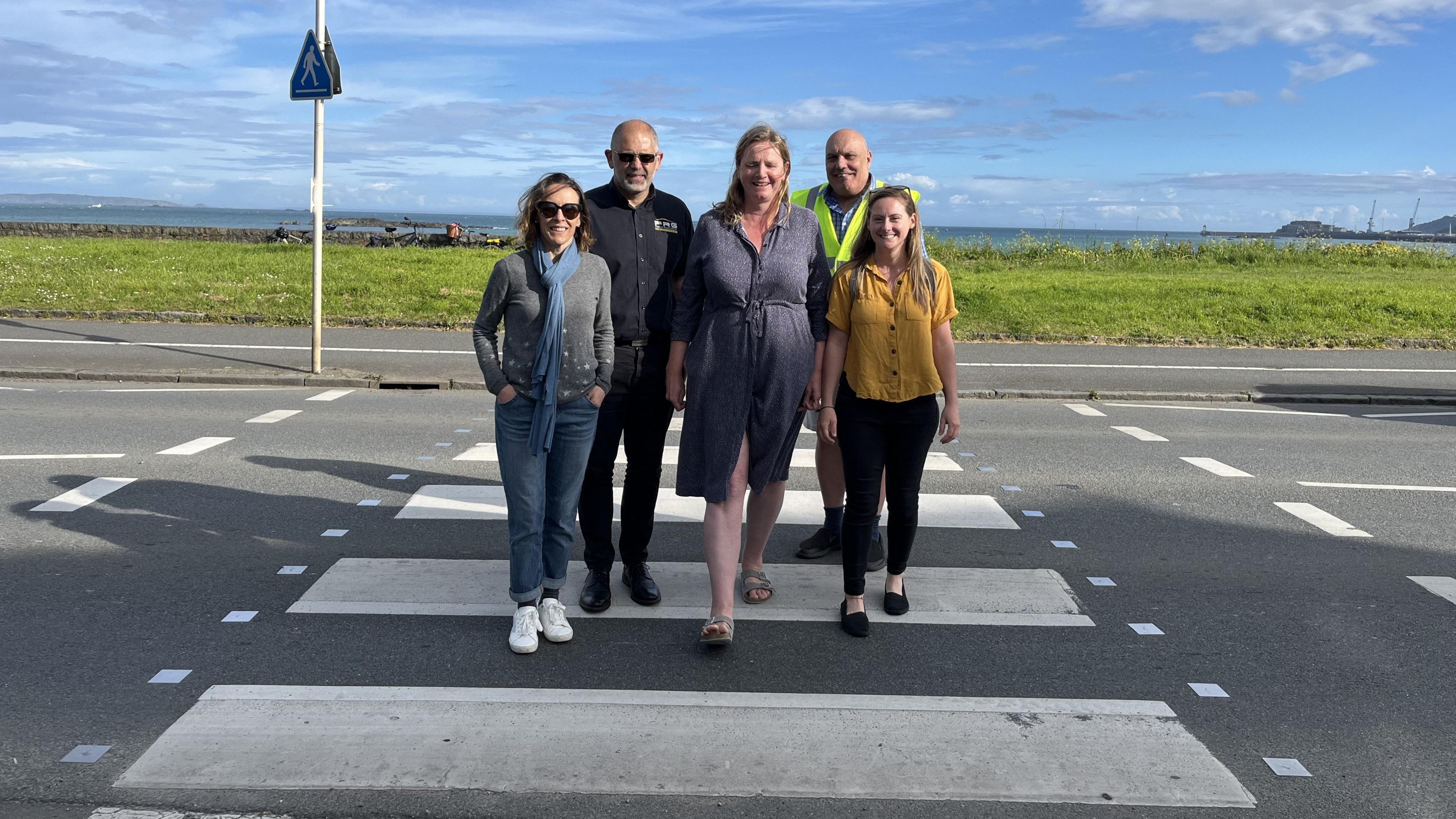 People using a zebra crossing