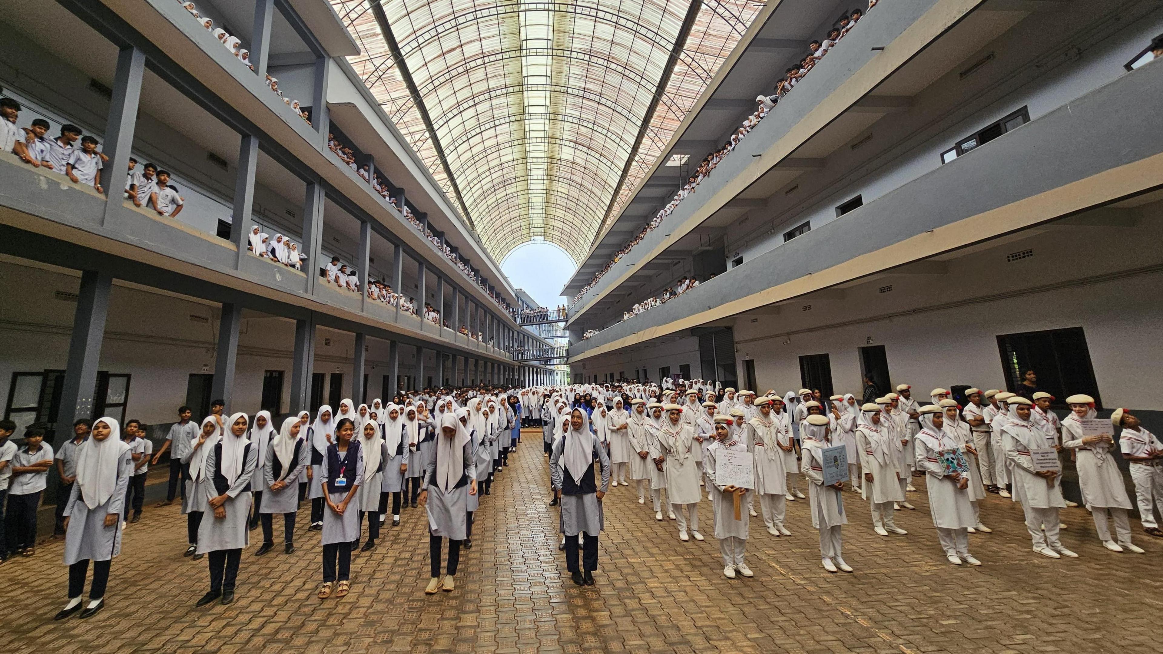 A group of students in uniform in Kerala state during a Zumba session. Several religious groups in Kerala have opposed the government's decision to introduce Zumba classes in schools. 