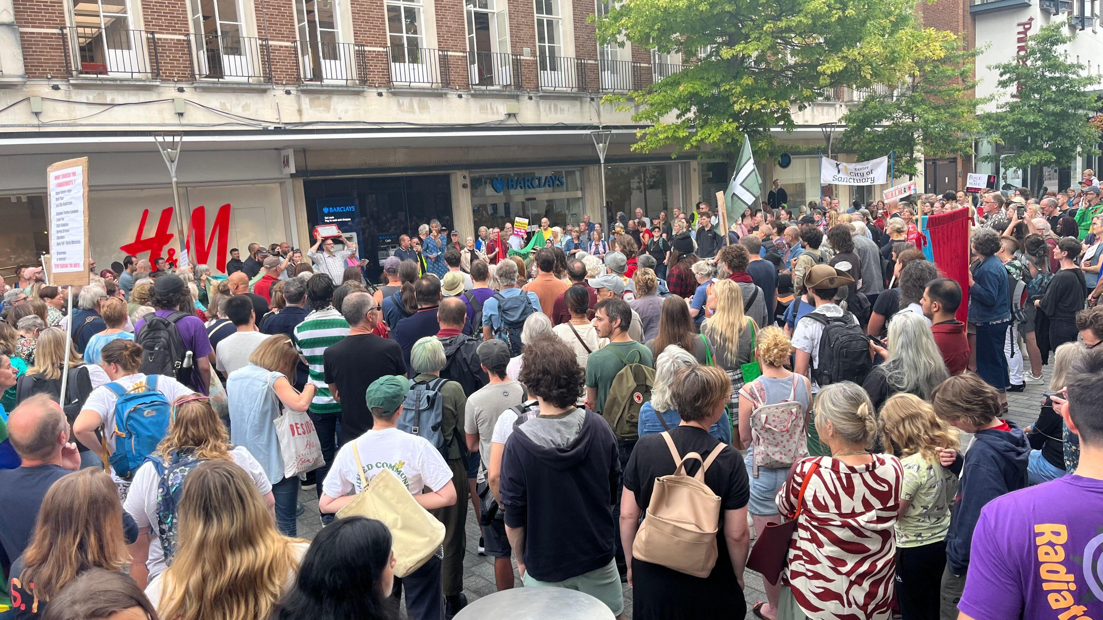 People gathering in Bedford Square, Exeter