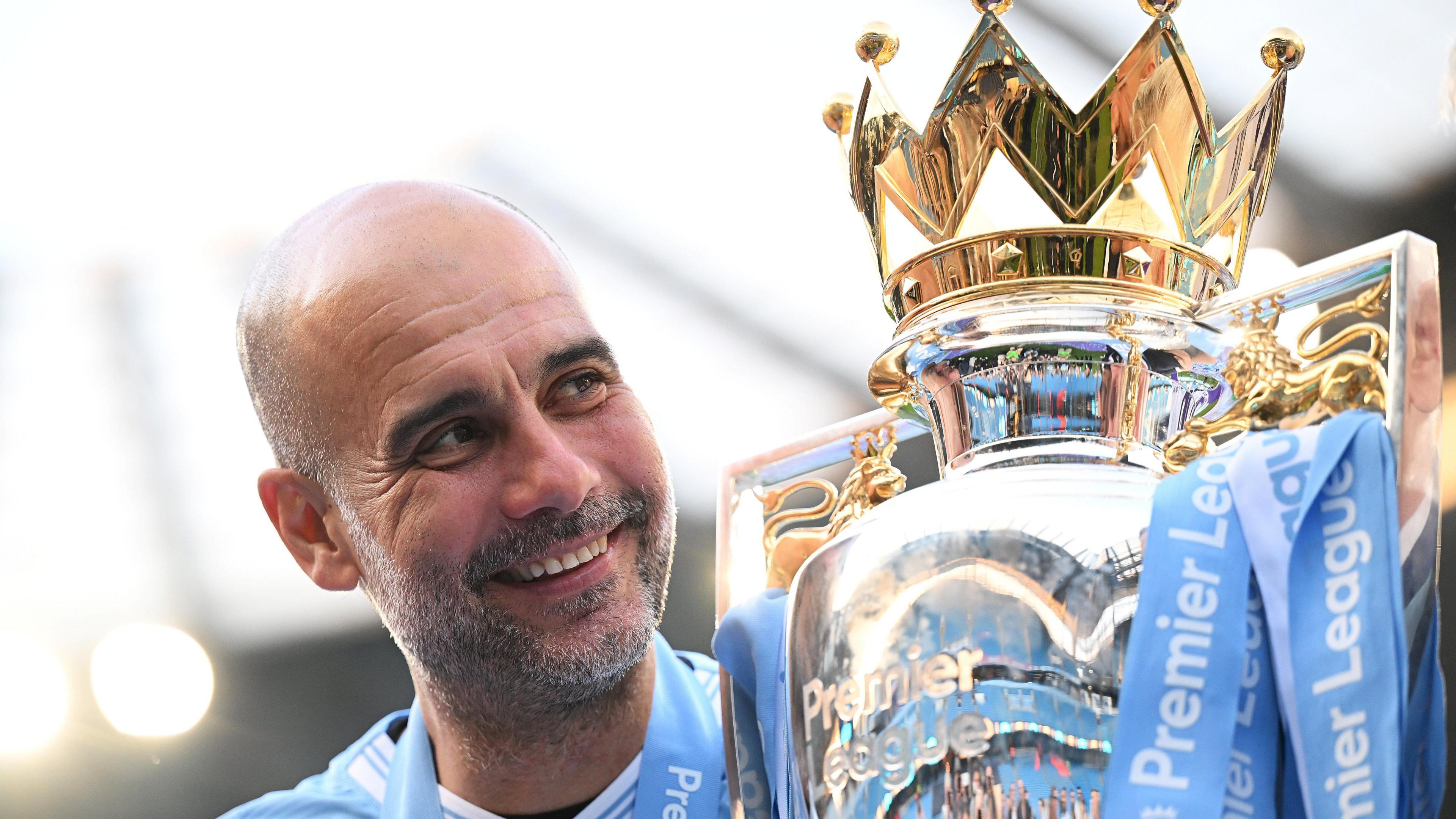 Pep Guardiola and Premier League trophy