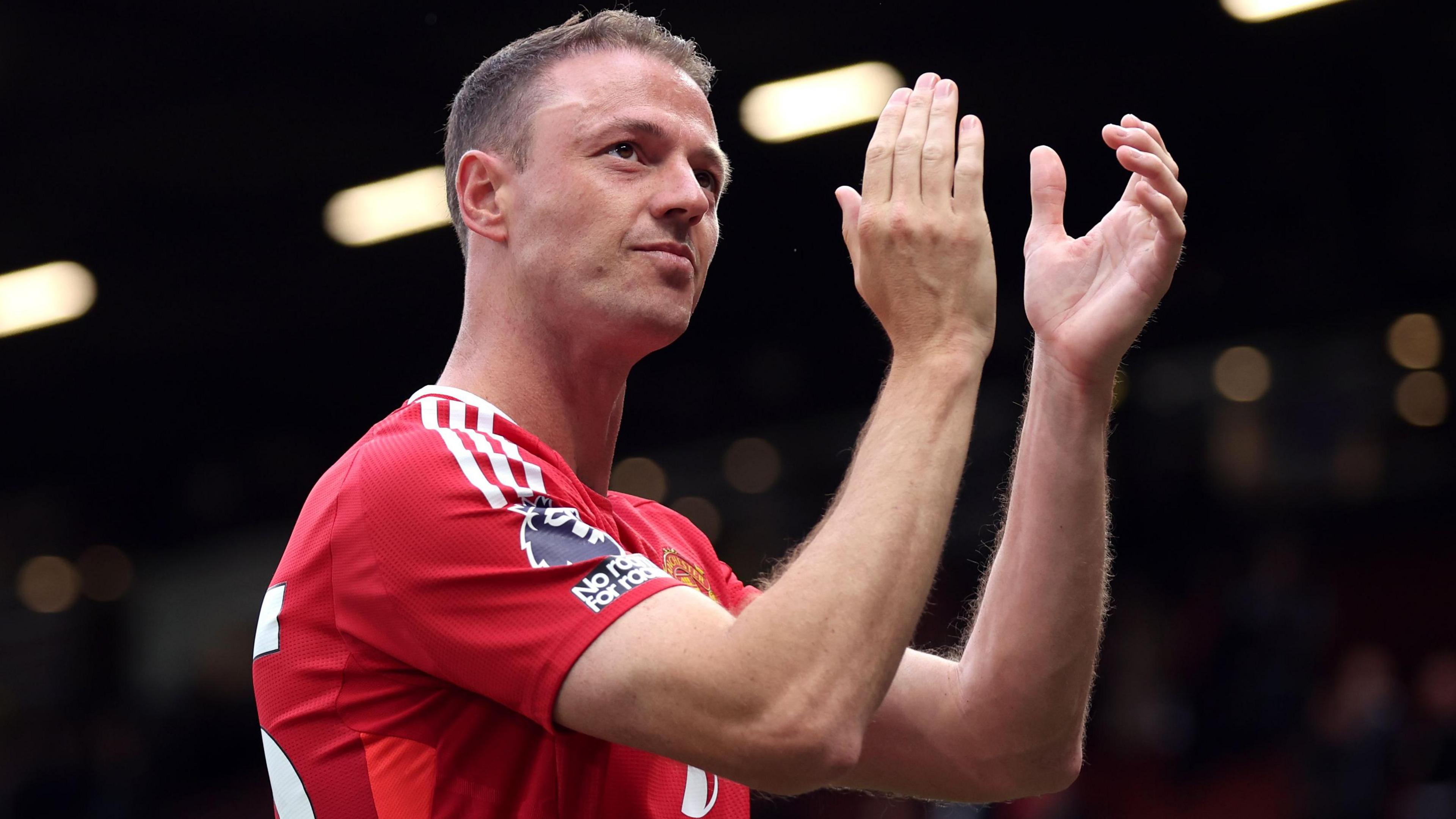 Jonny Evans applauds Manchester United fans