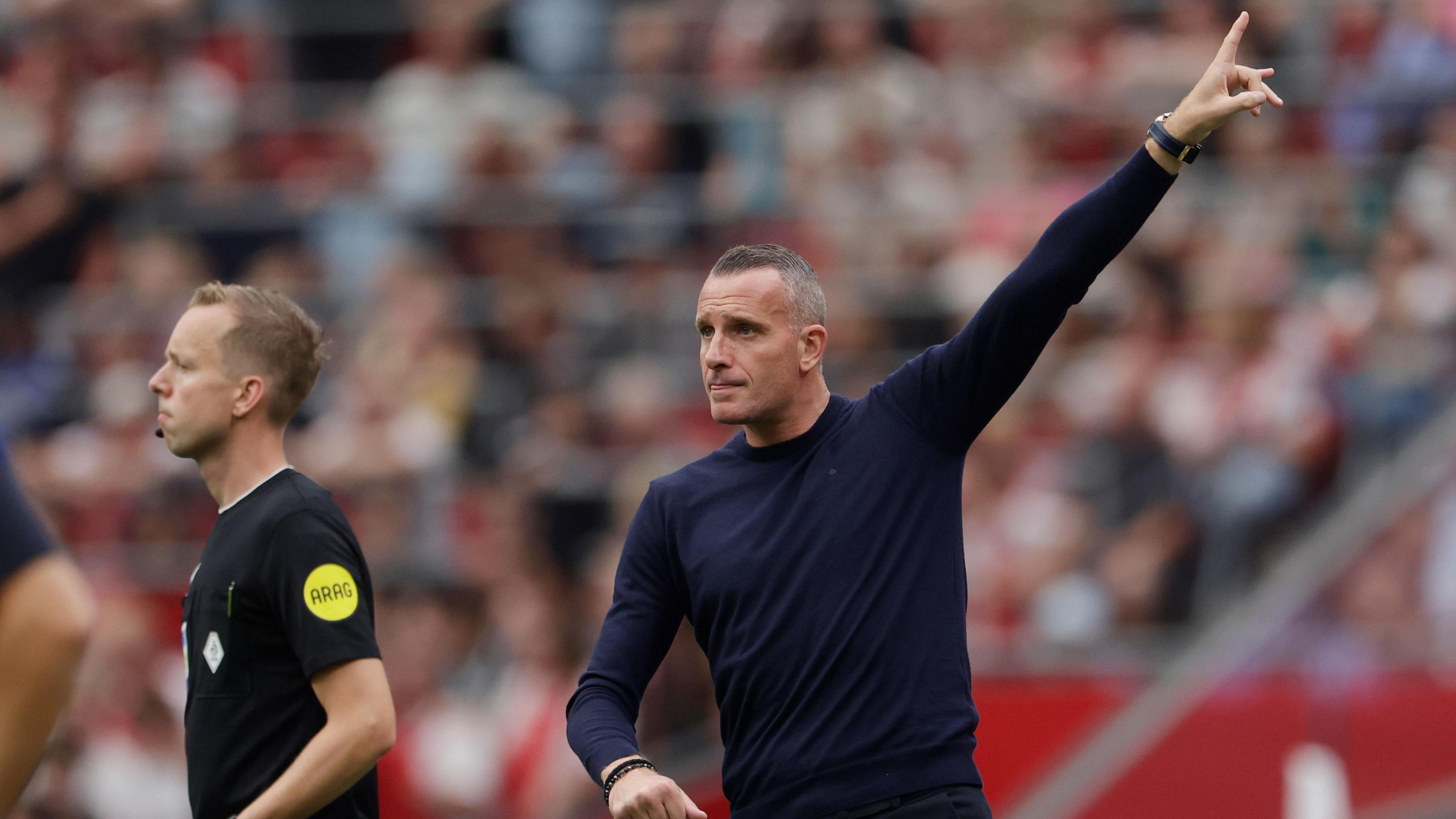 A photo of Nicky Hayen pointing up while instructing his Burnley side during a pre-season friendly against Ajax in July