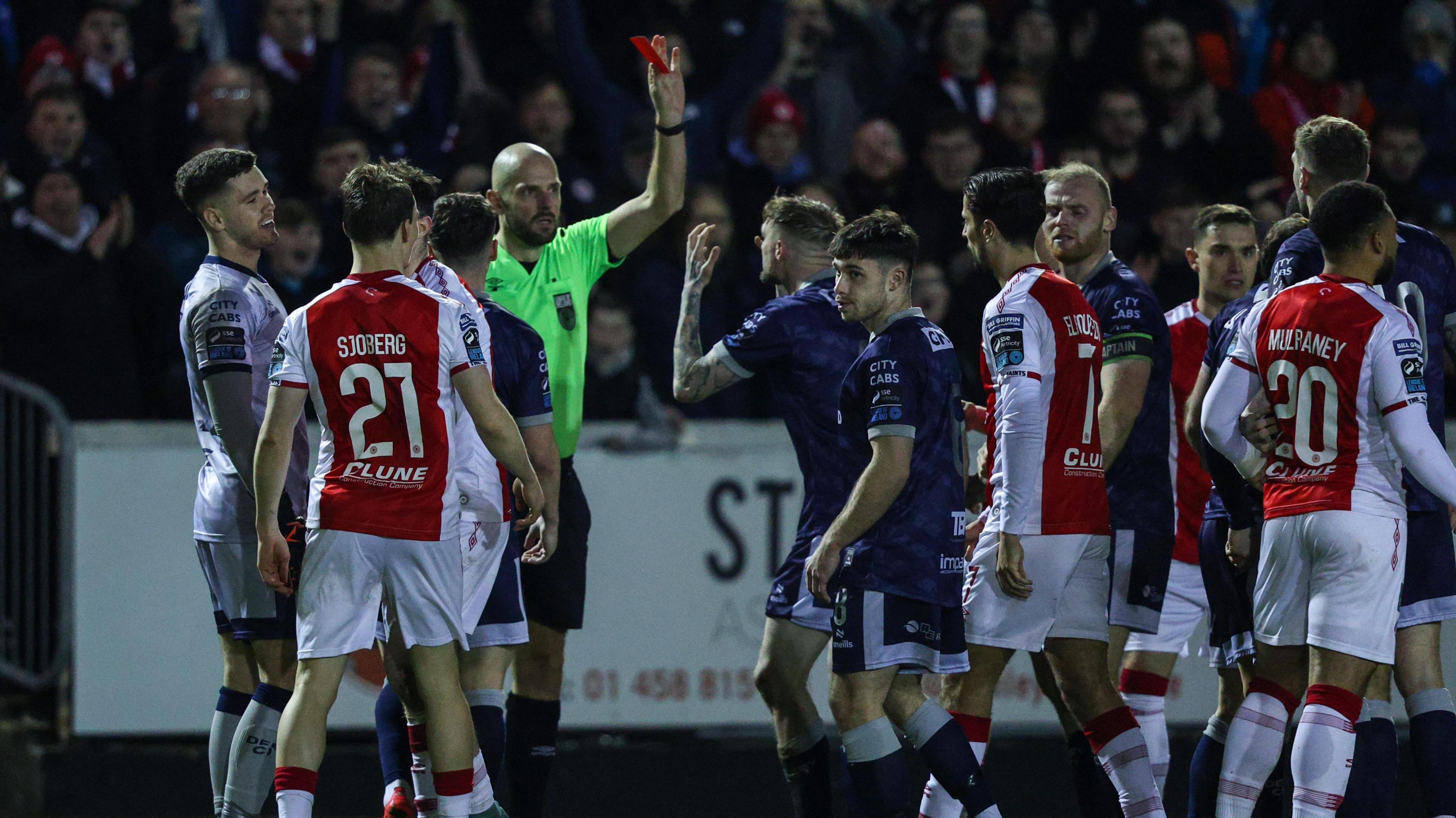 Carl Winchester is shown a red card