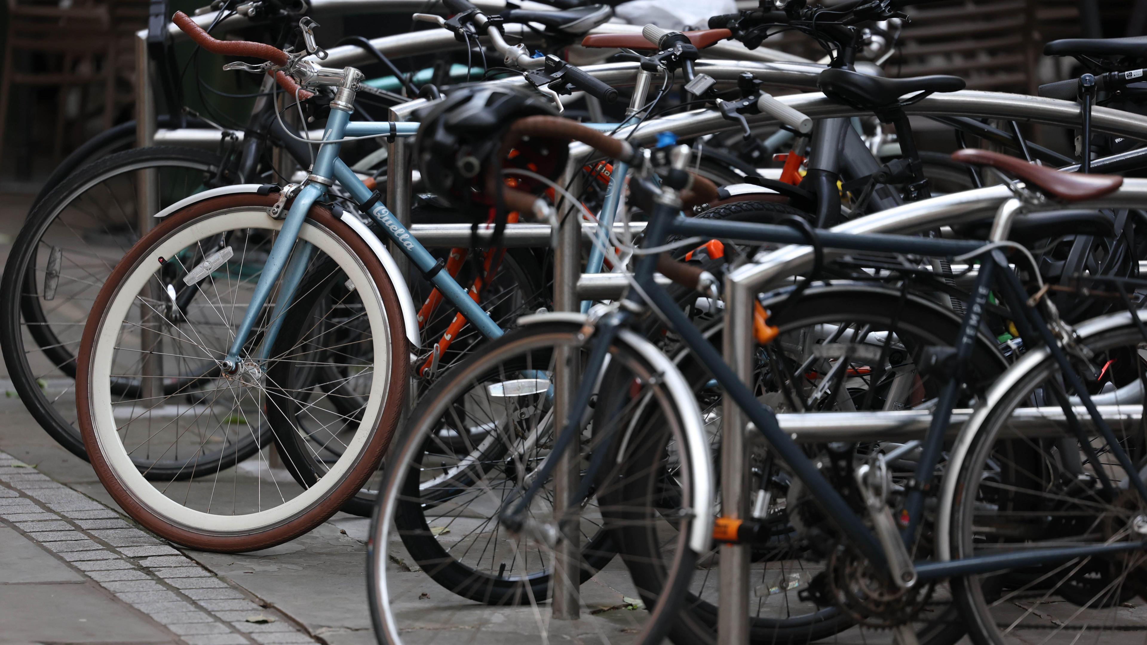 Close-up of parked bikes