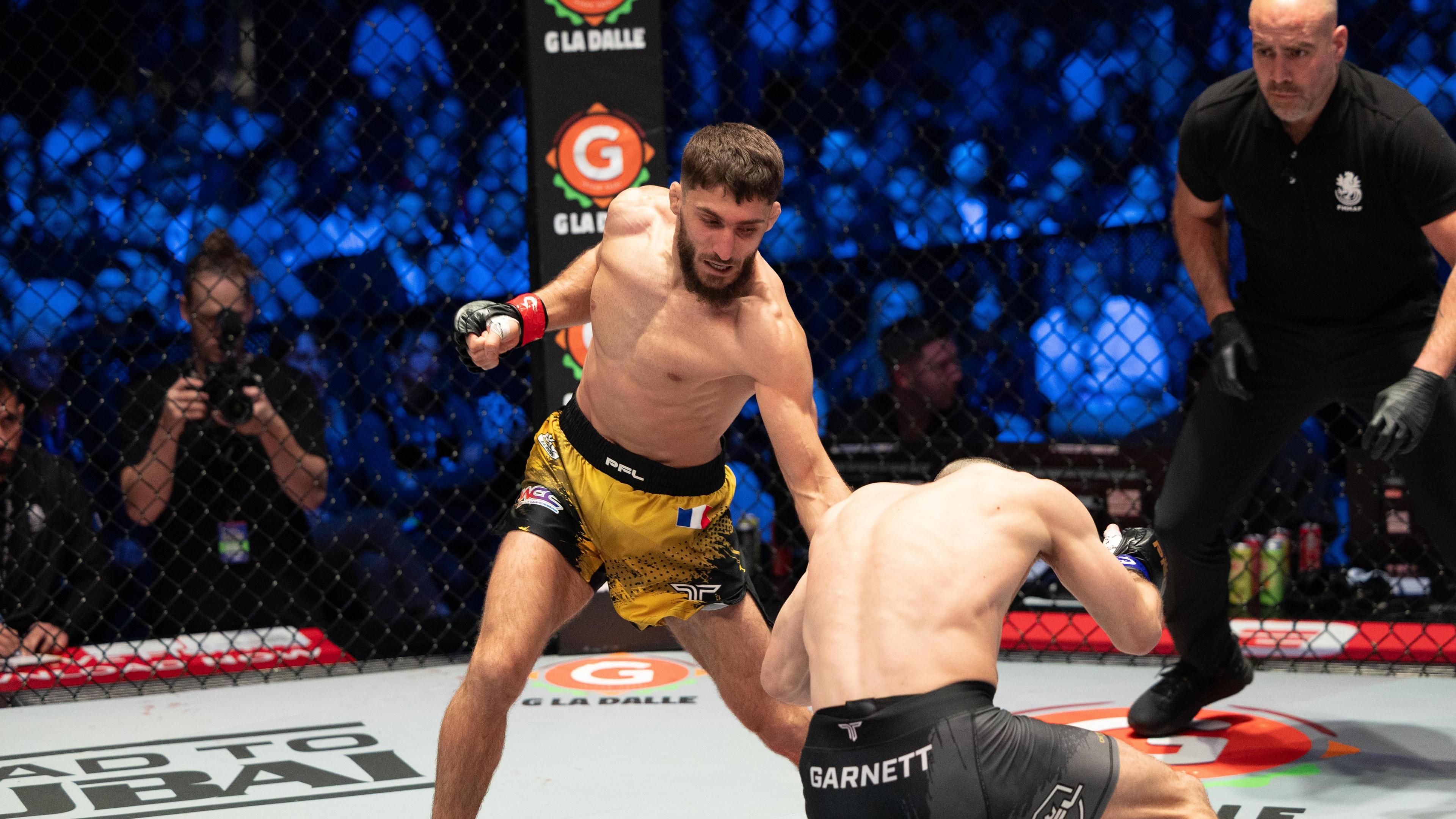 Dean Garnett in action against Baris Adiguzel