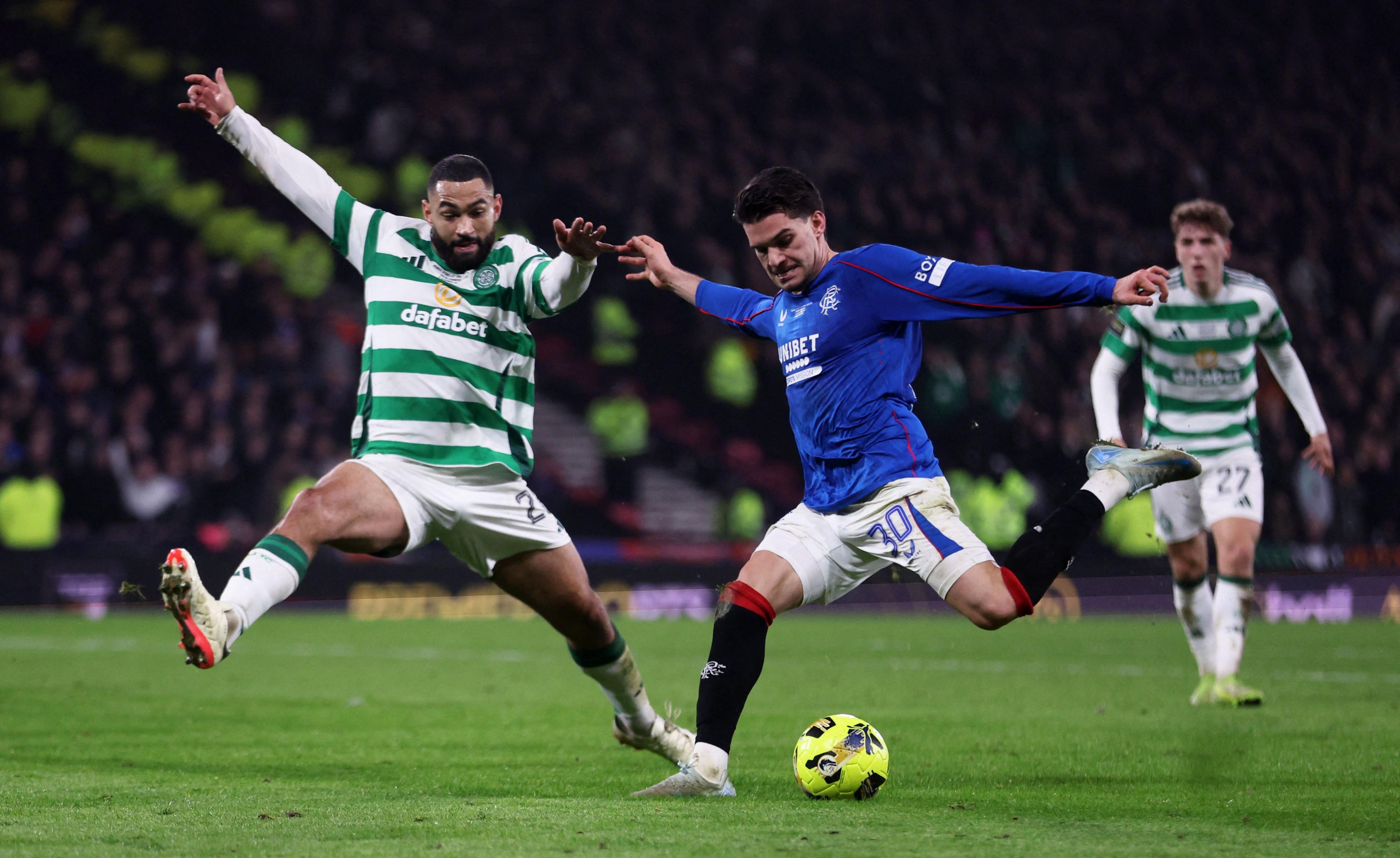 Celtic's Cameron Carter-Vickers in action with Rangers' Ianis Hagi 