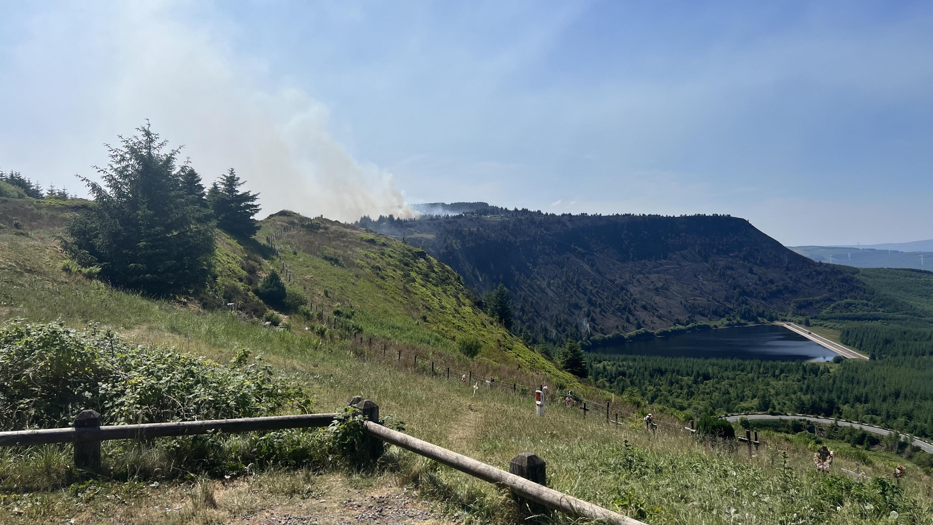 The view from Rhigos mountain reservoir as fire burns