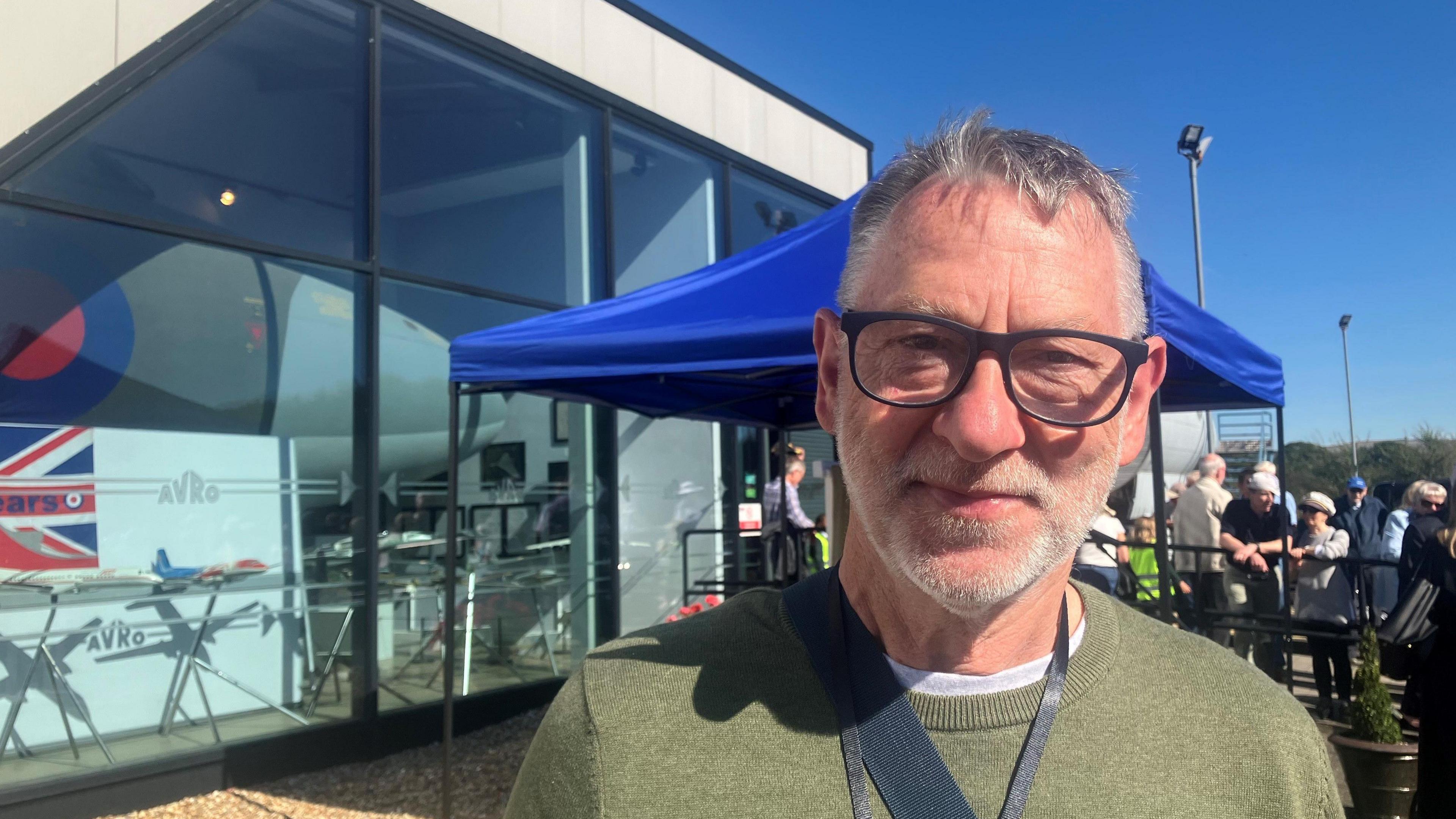 Photo of Frank Pleszak standing outside the Avro Heritage Museum