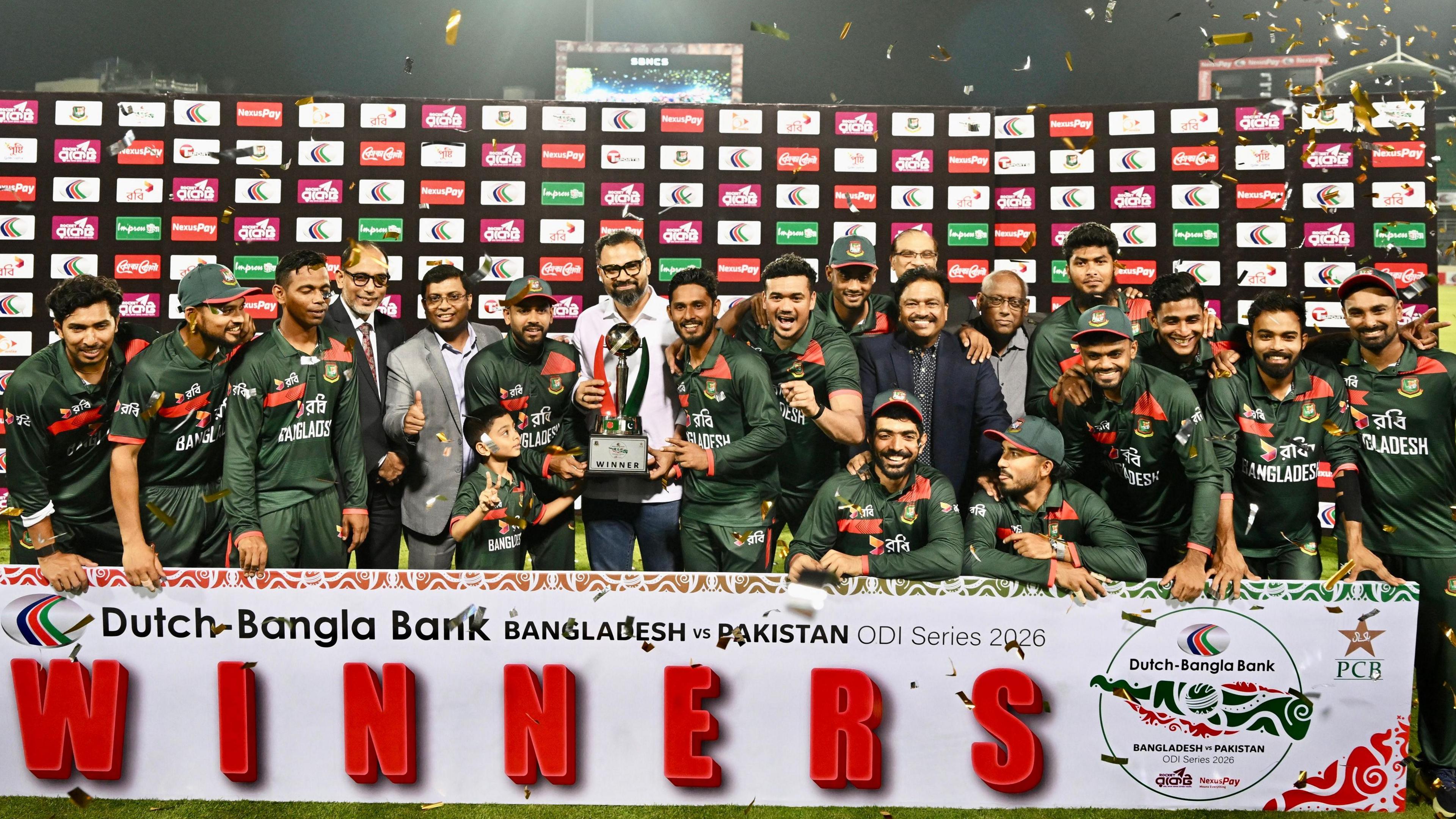 Bangladesh celebrate with the ODI series trophy
