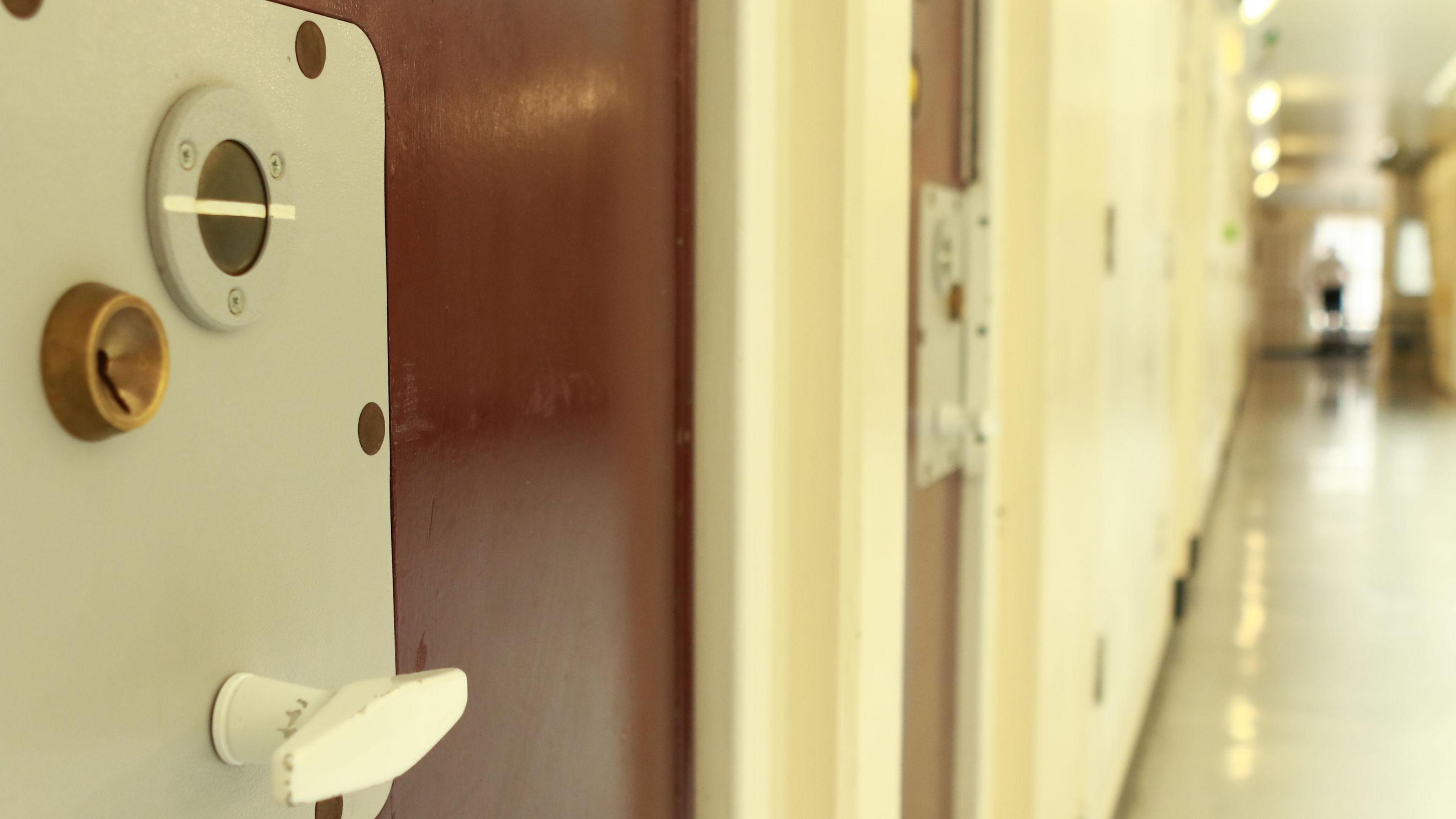 Generic shot of a prison cell door