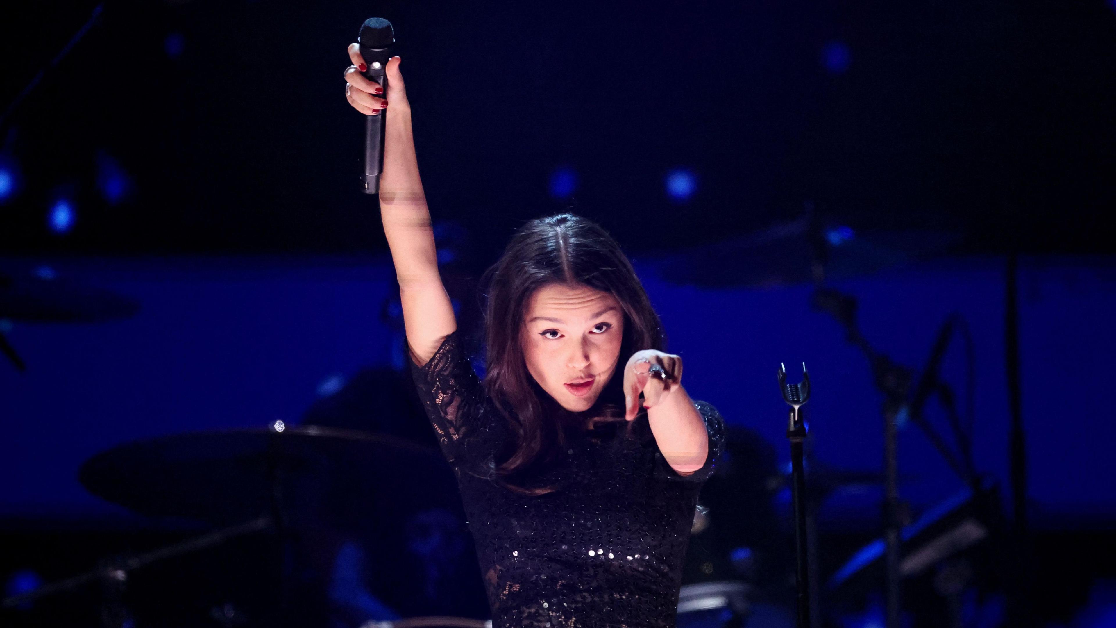 Olivia rodrigo performing at LA fireaid concert