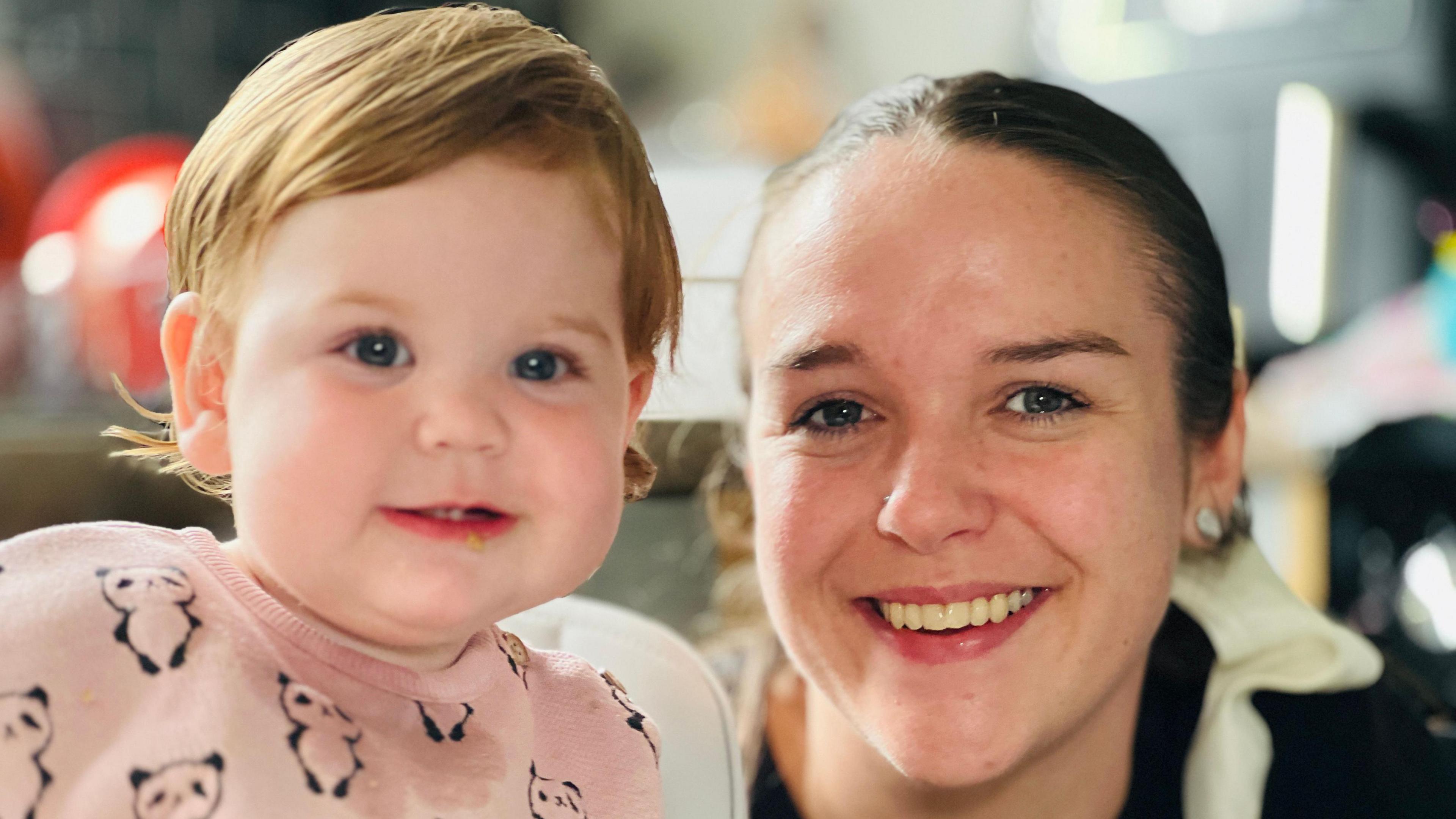 Charlotte Fawcett pictured with her daughter