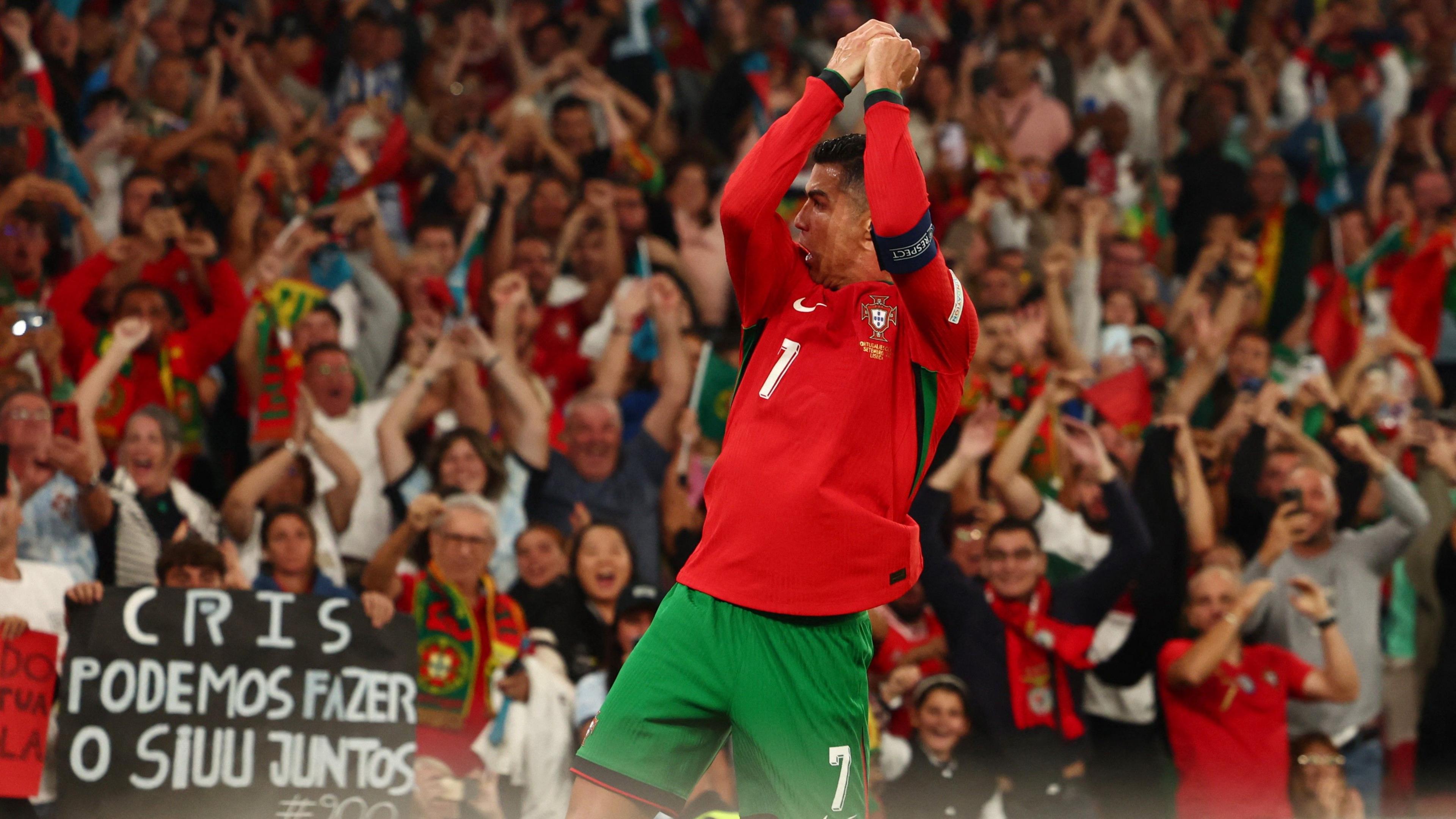 Cristiano Ronaldo of Portugal celebrates after scoring against Scotland in the Nations League