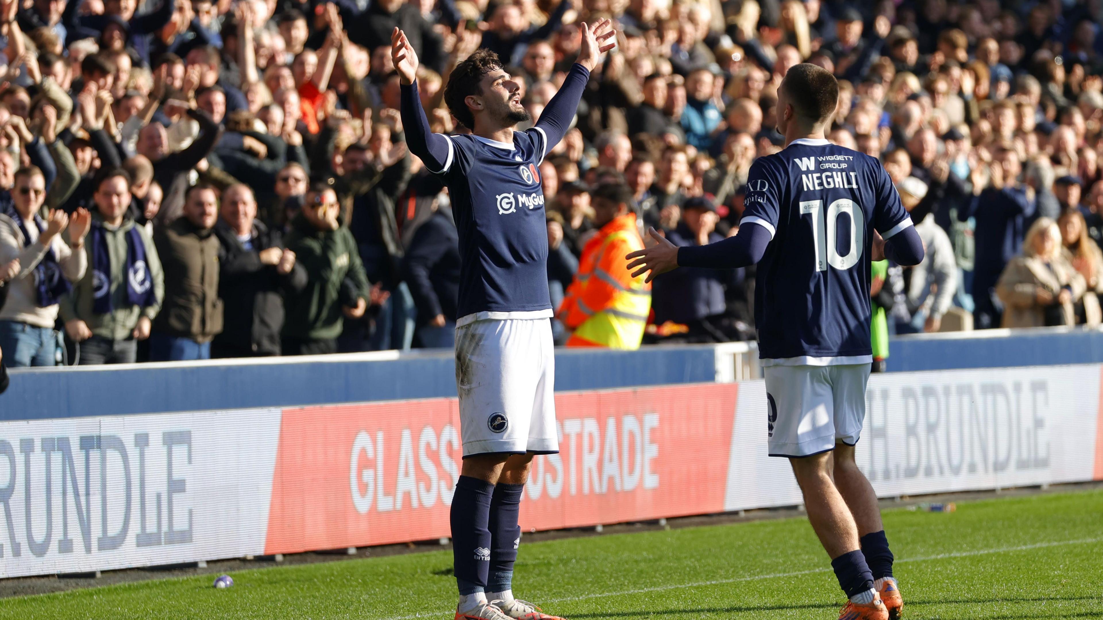 Mihailo Ivanovic (left) celebrates scoring for Millwall against Preston North End