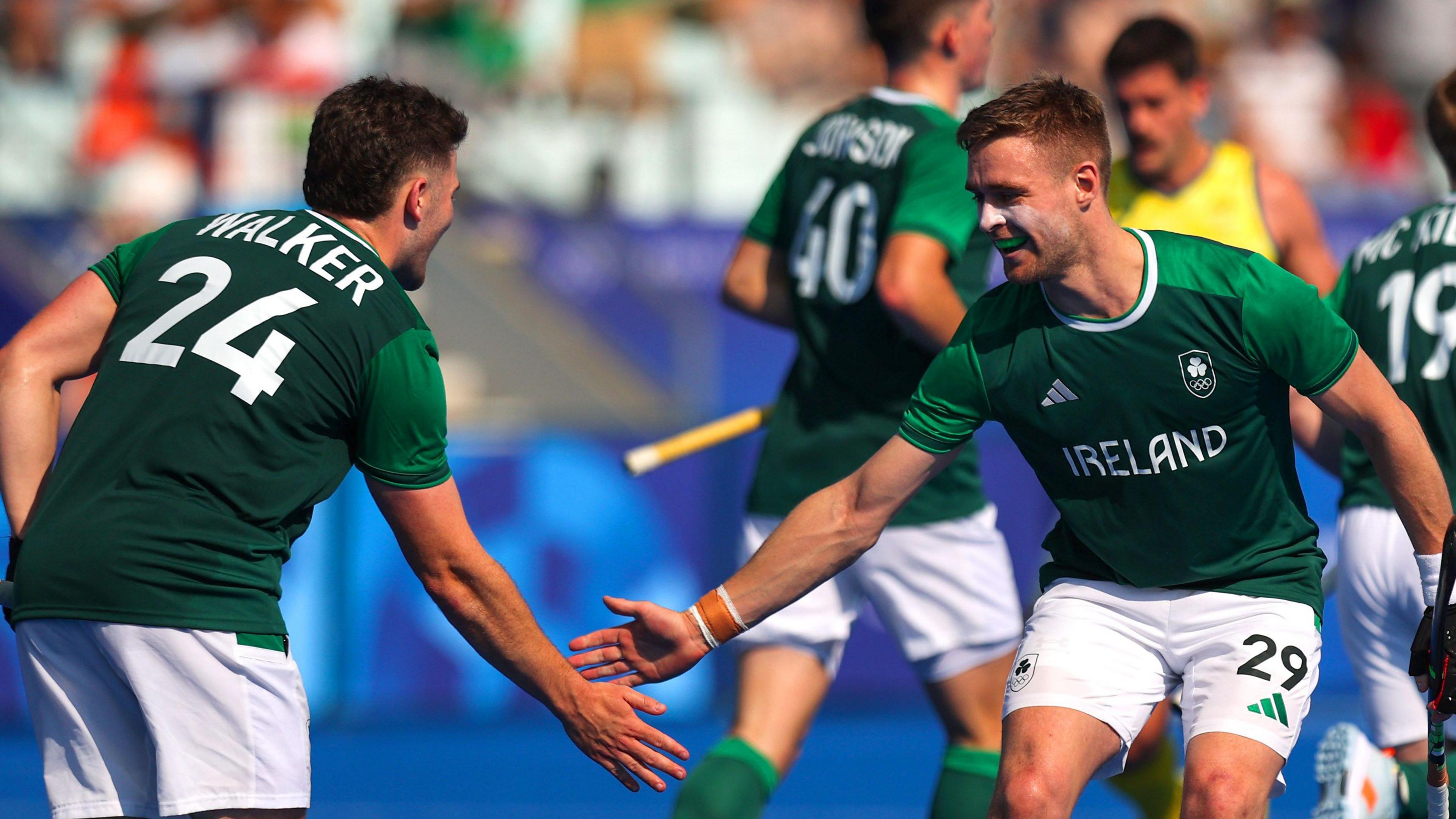 Lee Cole celebrates scoring their first goal with Benjamin Walker