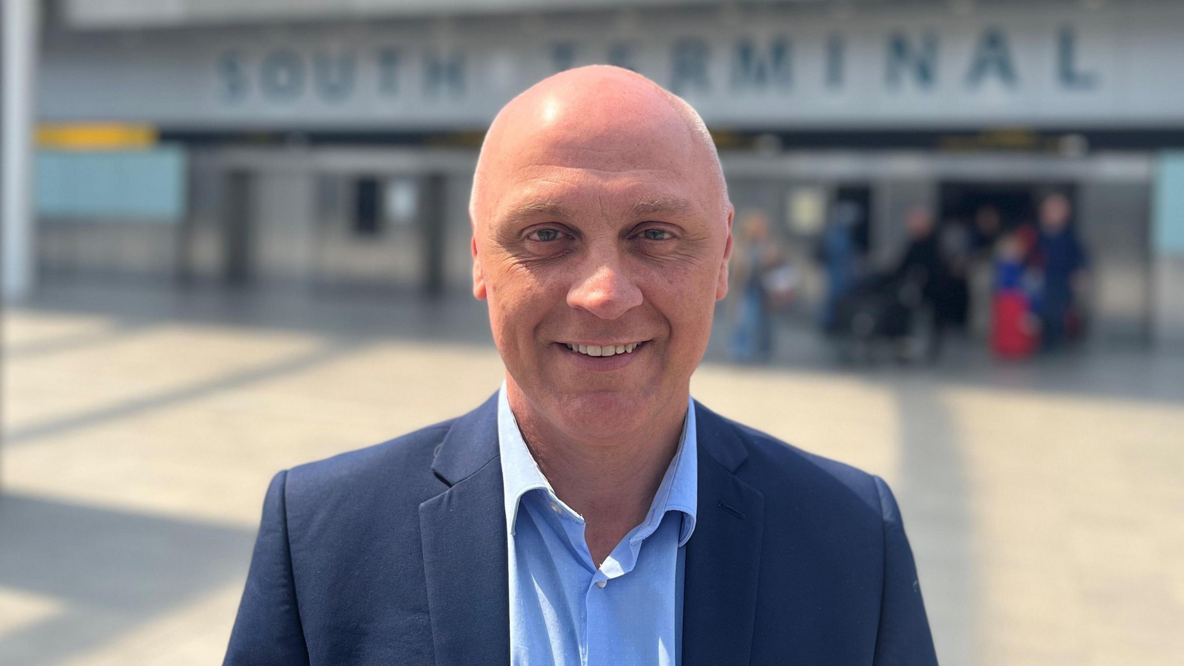 Richard Sargeant from Trading Standards standing outside South Terminal at Gatwick