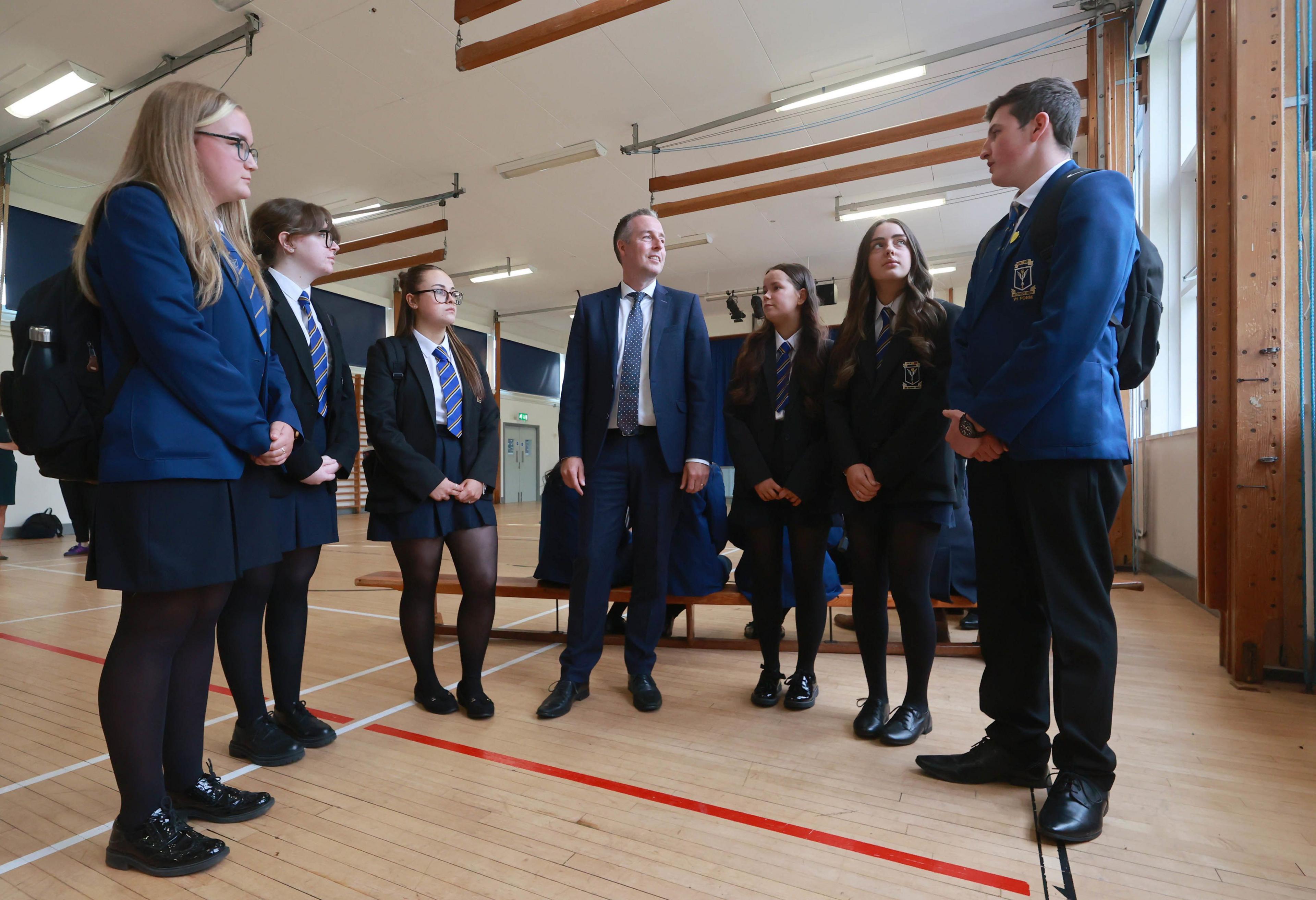 Paul Givan speaking to students during a visit to St Columbanus' College in Bangor on Tuesday