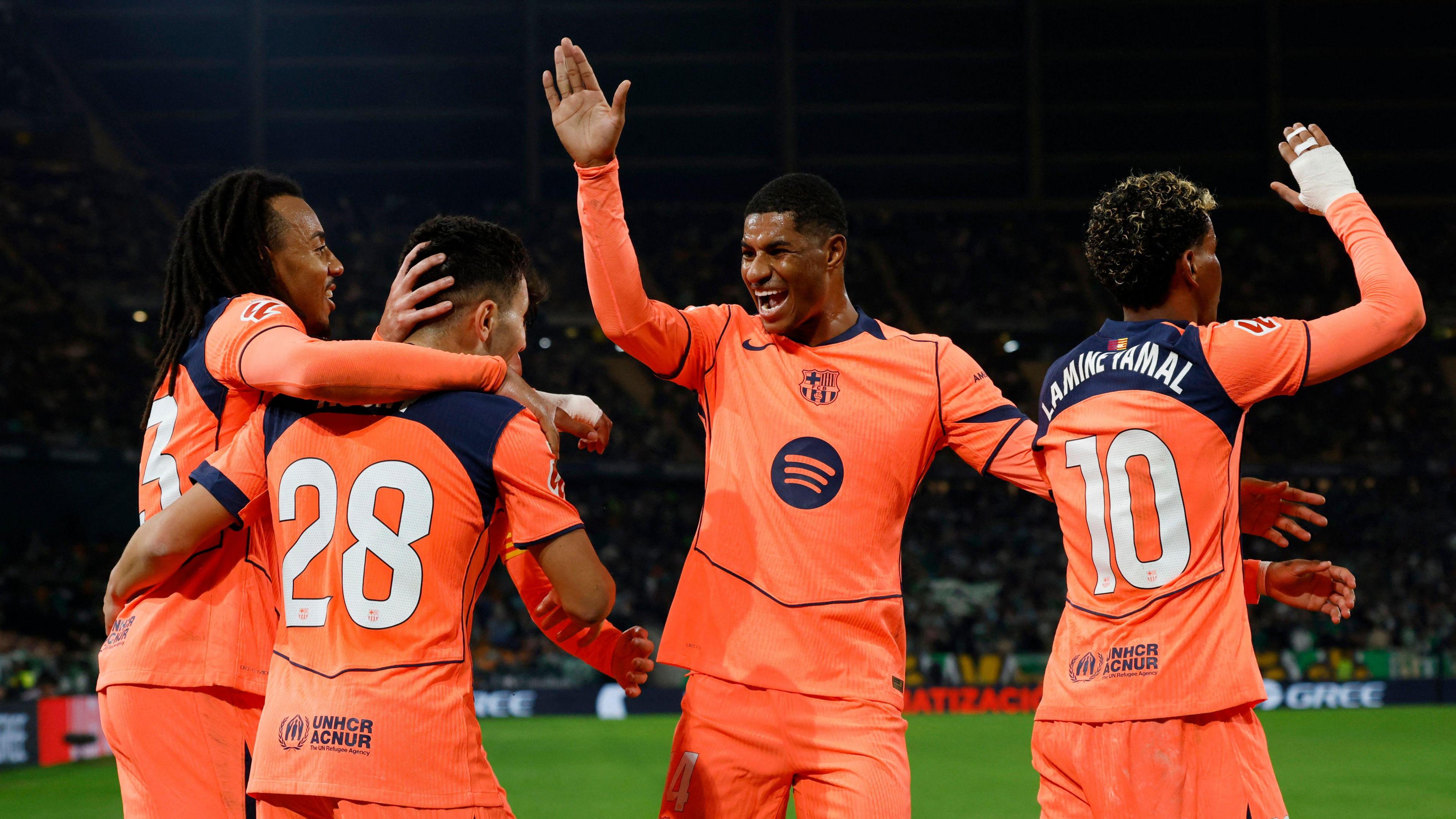 Rashford celebrating with teammates.