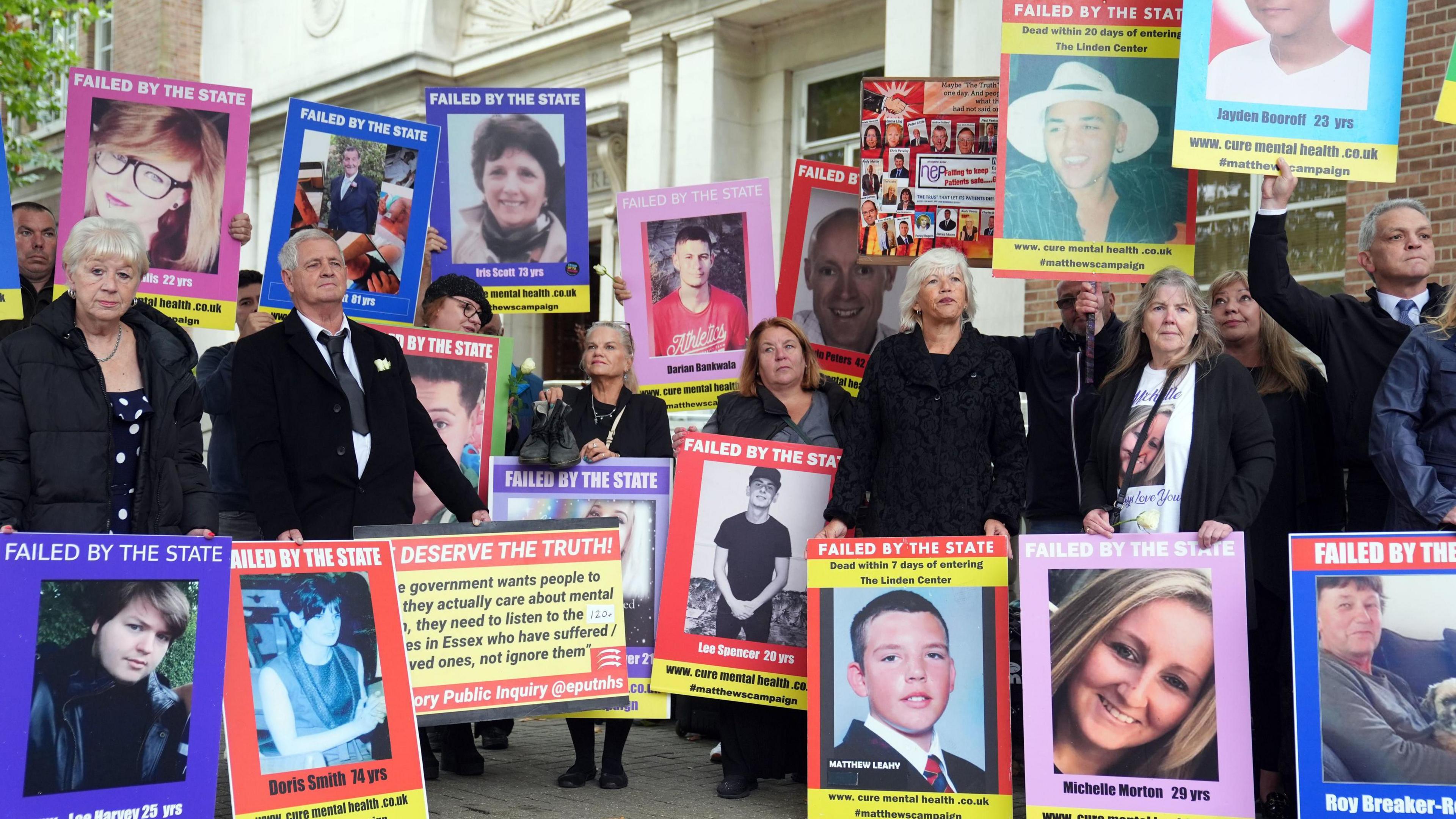 Bereaved families gathering outside Chelmsford Civic Centre on the opening day of the Lampard Inquiry