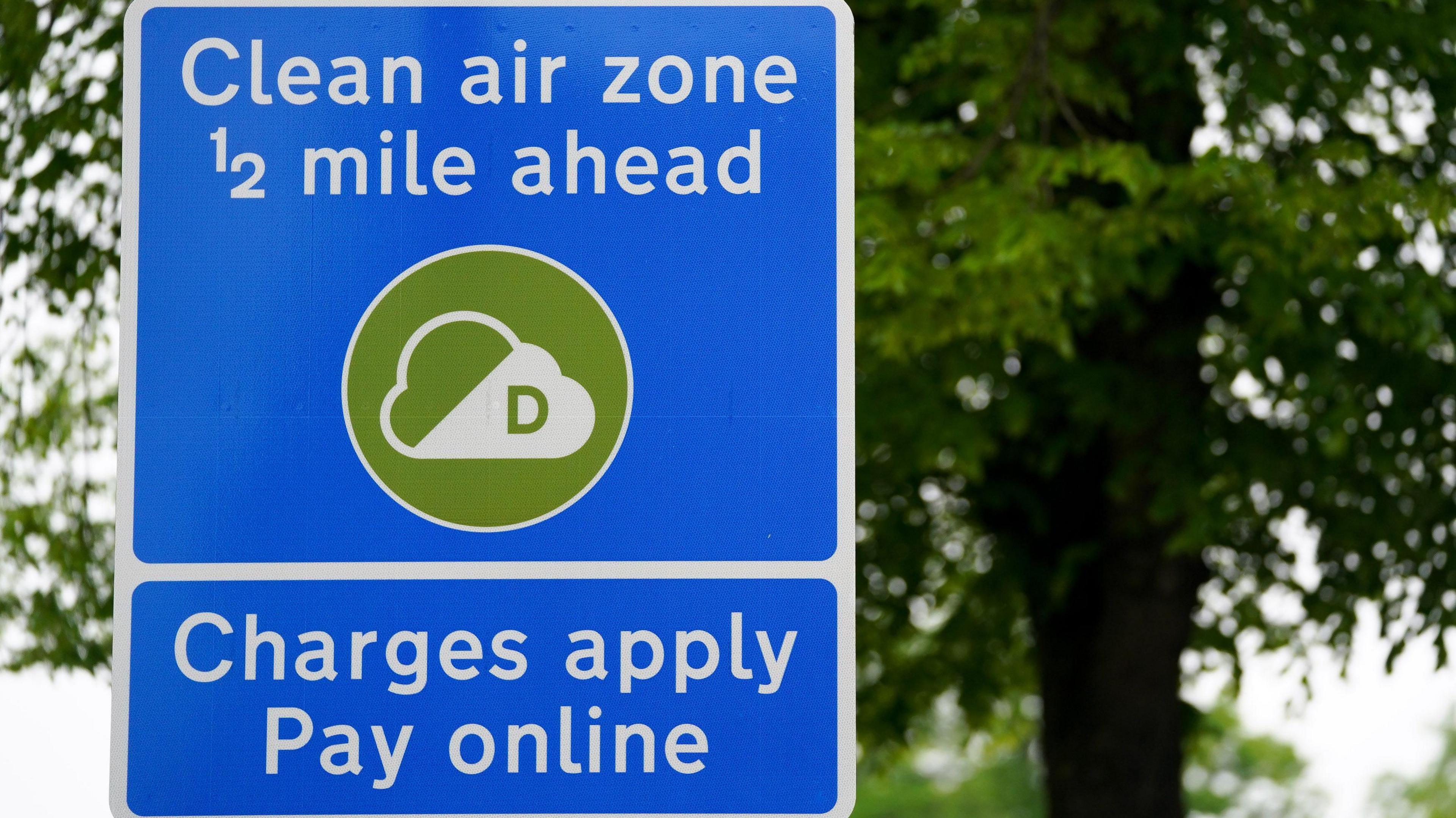 A sign in Birmingham City Centre informing road users of the Clean Air Zone initiative