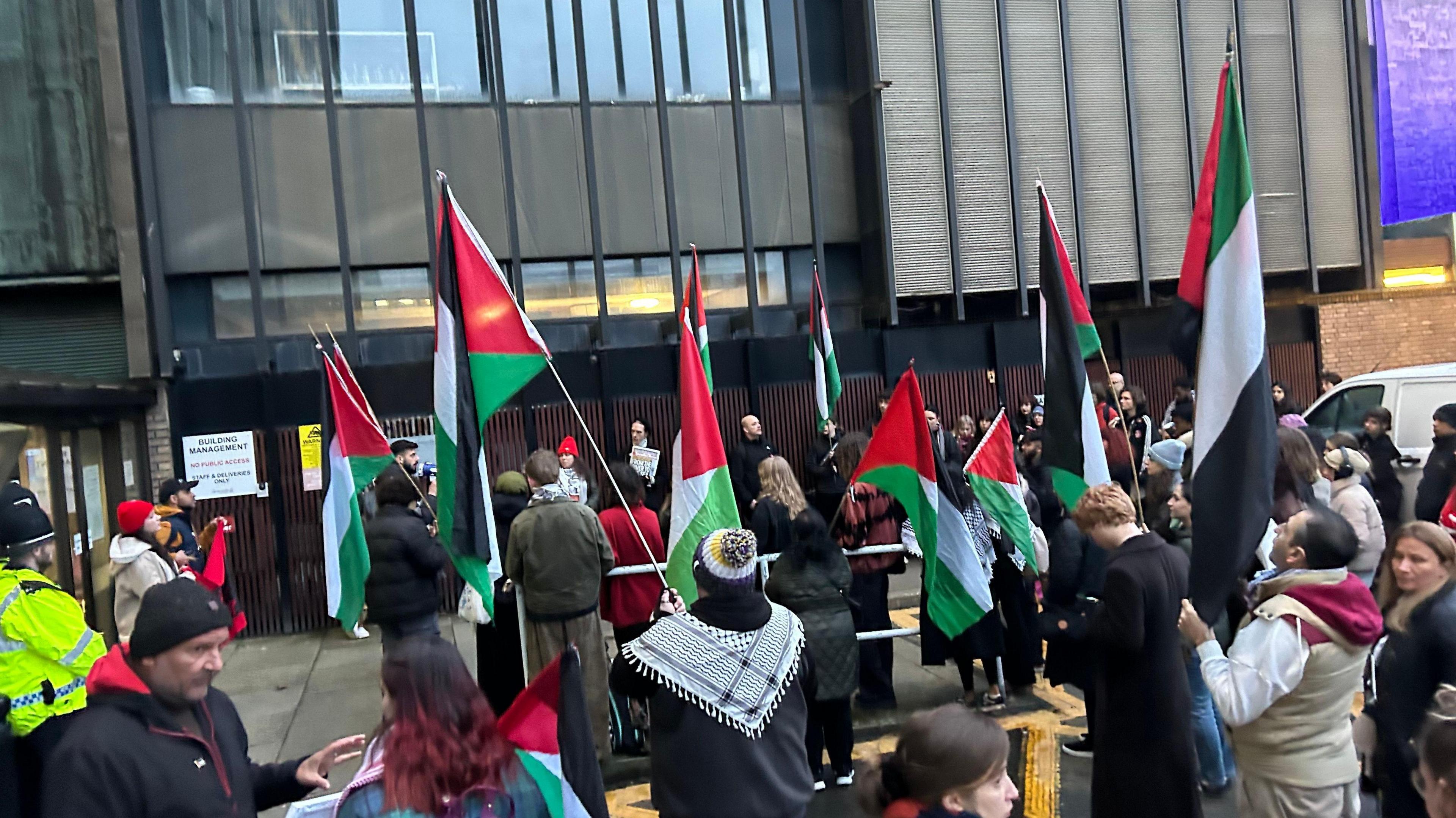 Protesters gathering outside of Newcastle Civic Centre