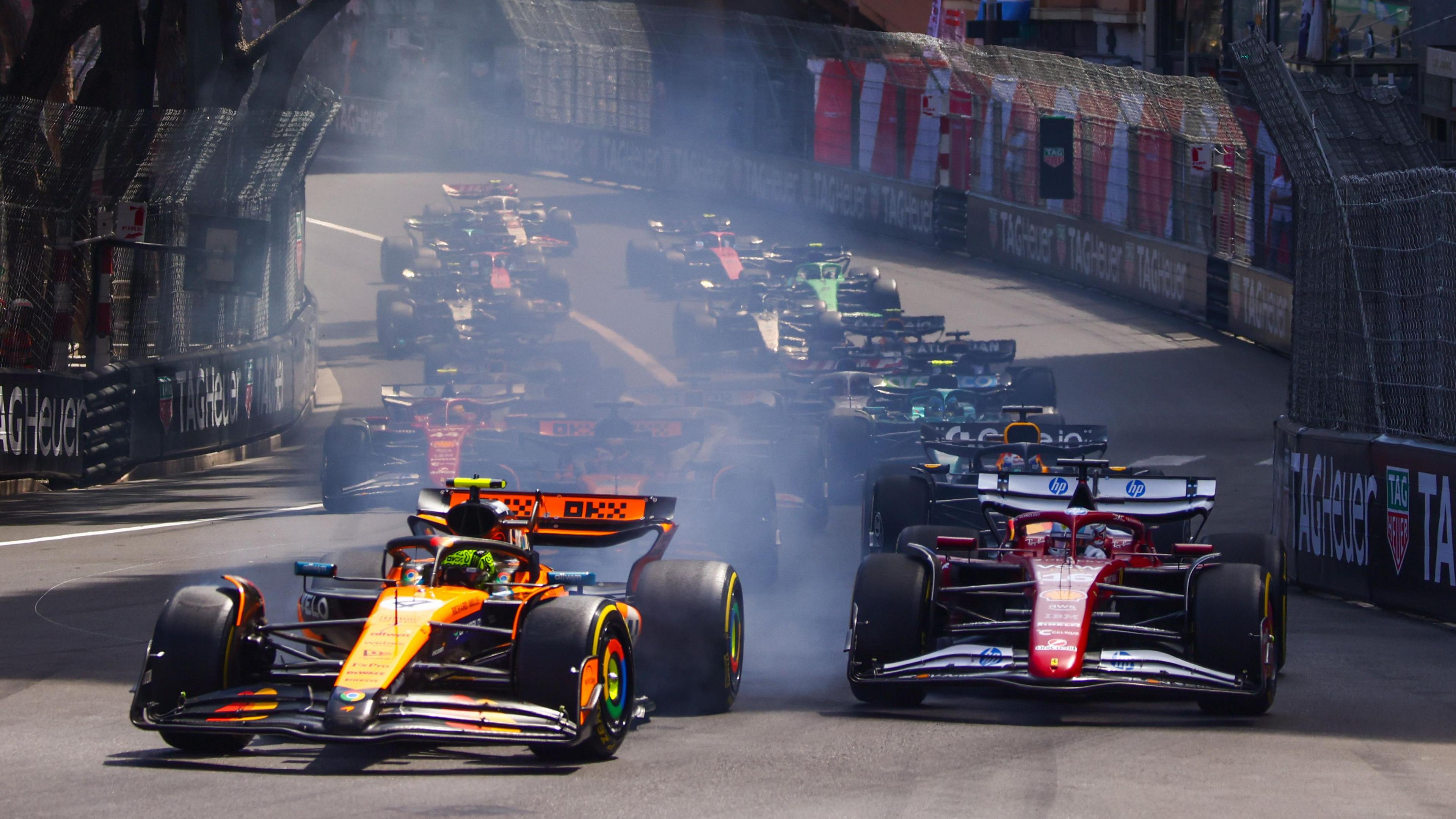 McLaren's Lando Norris leads the field into the first corner of the 2025 Monaco Grand Prix