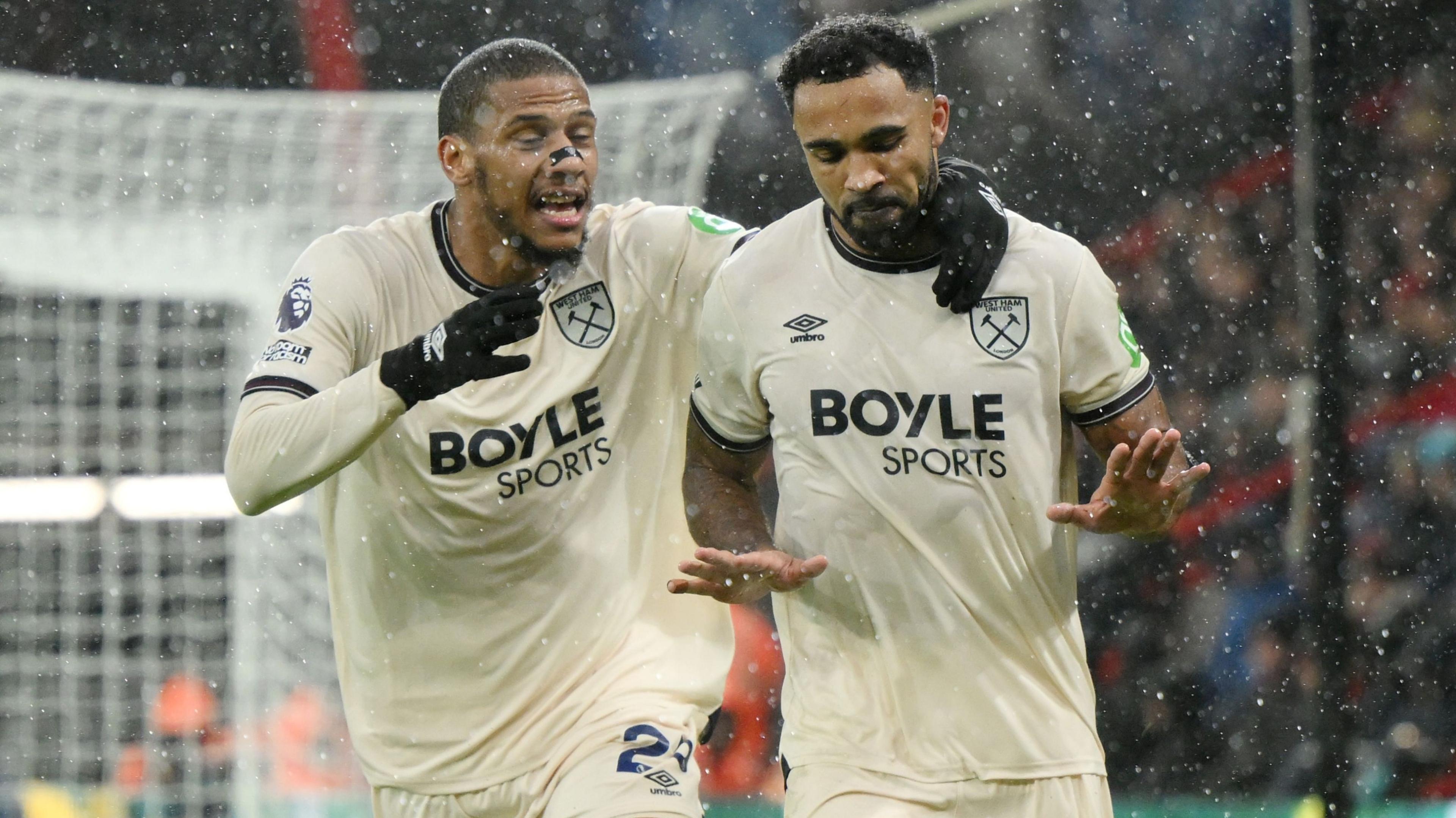 Callum Wilson of West Ham United celebrates scoring his team's second goal with teammate Jean-Clair Todibo