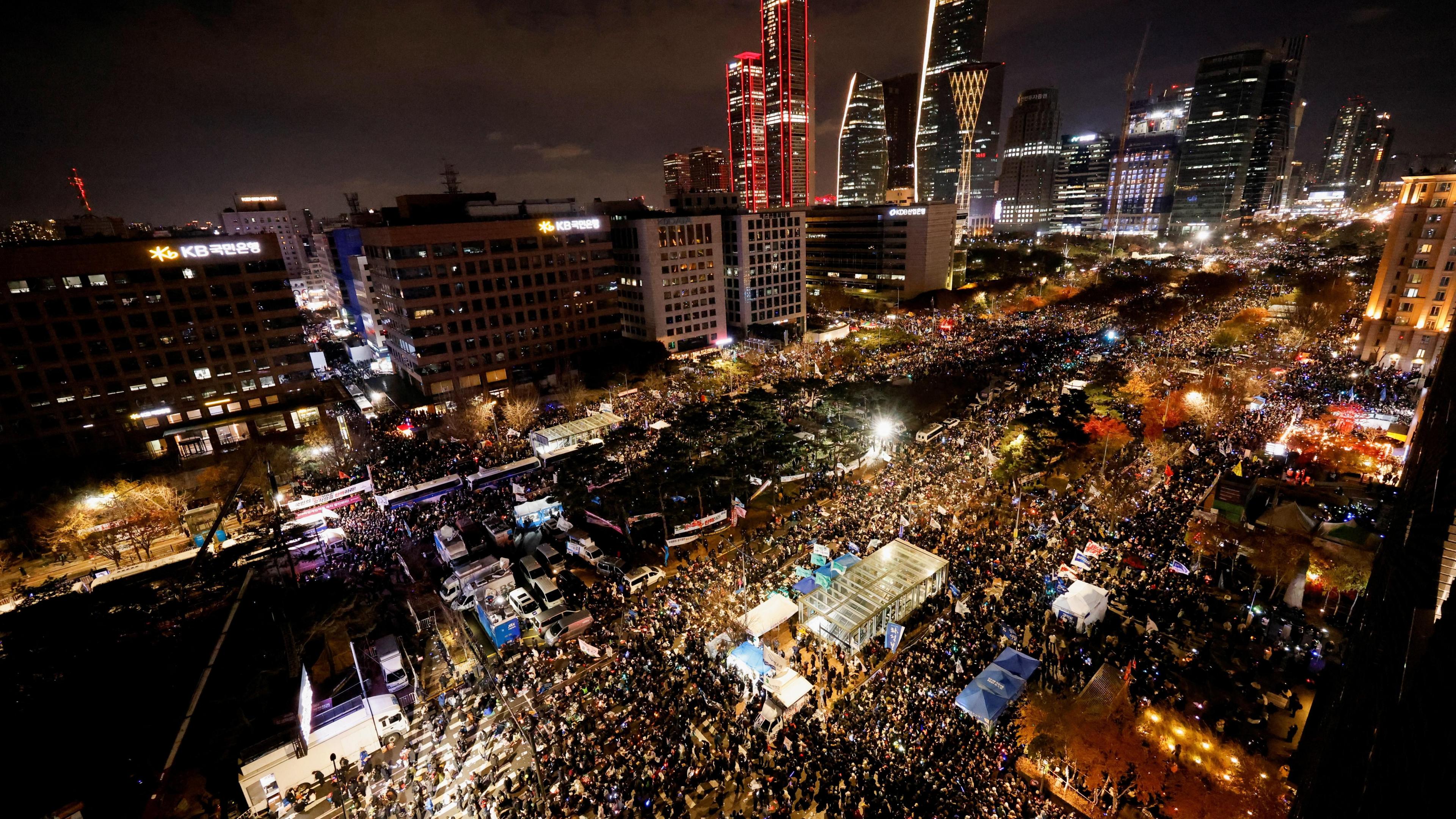 Protesters take part in a rally calling for the impeachment of South Korean President Yoon Suk Yeol, who declared martial law, which was reversed hours later, near the National Assembly in Seoul, South Korea, 