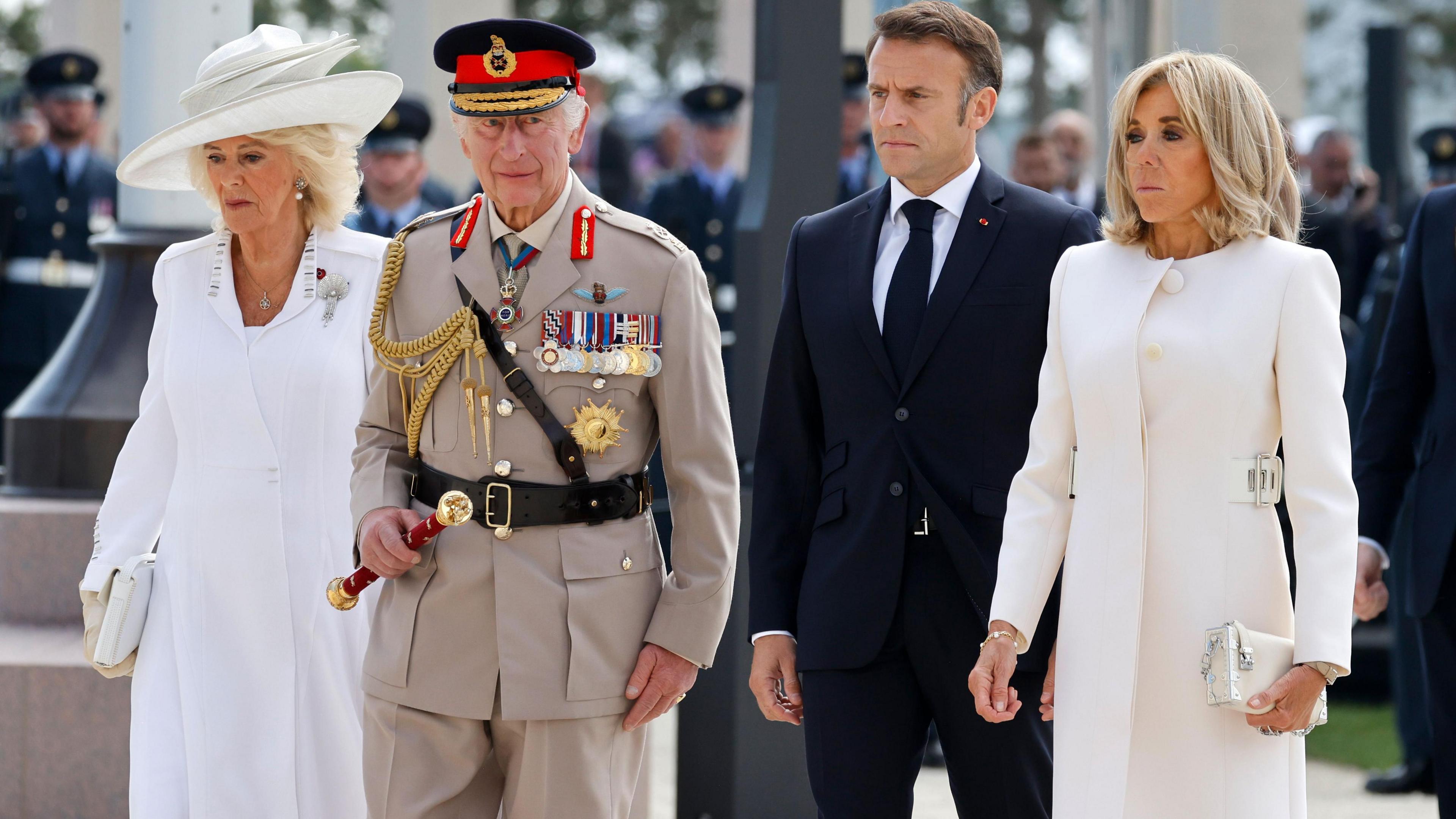 Britain's Queen Camilla, Britain's King Charles III, France's President Emmanuel Macron and French President's wife Brigitte Macron attend the UK Ministry of Defence and the Royal British Legion's commemorative ceremony marking the 80th anniversary of the World War II 'D-Day' Allied landings in Normandy