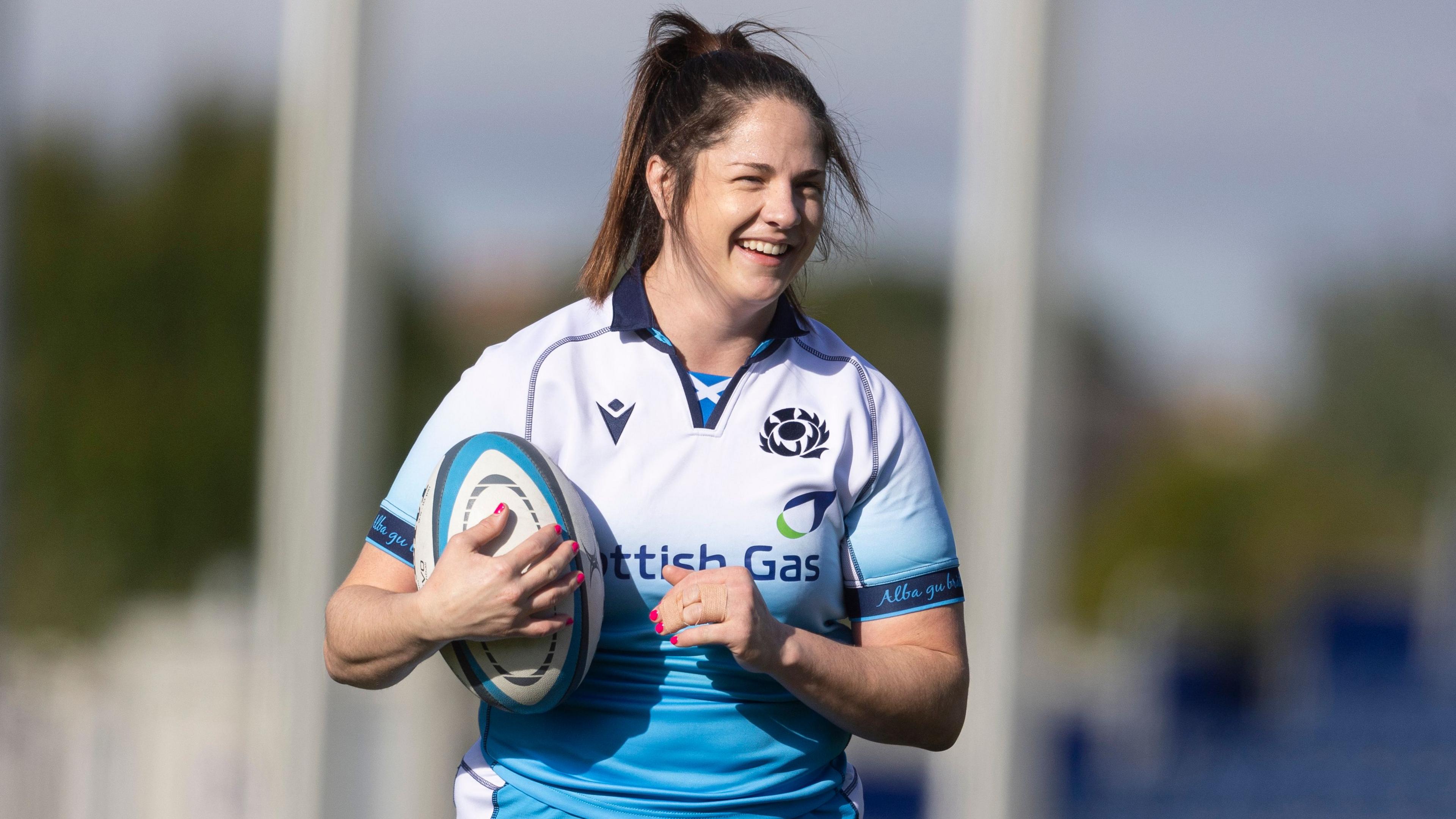 Christine Belisle smiles during a Scotland training session