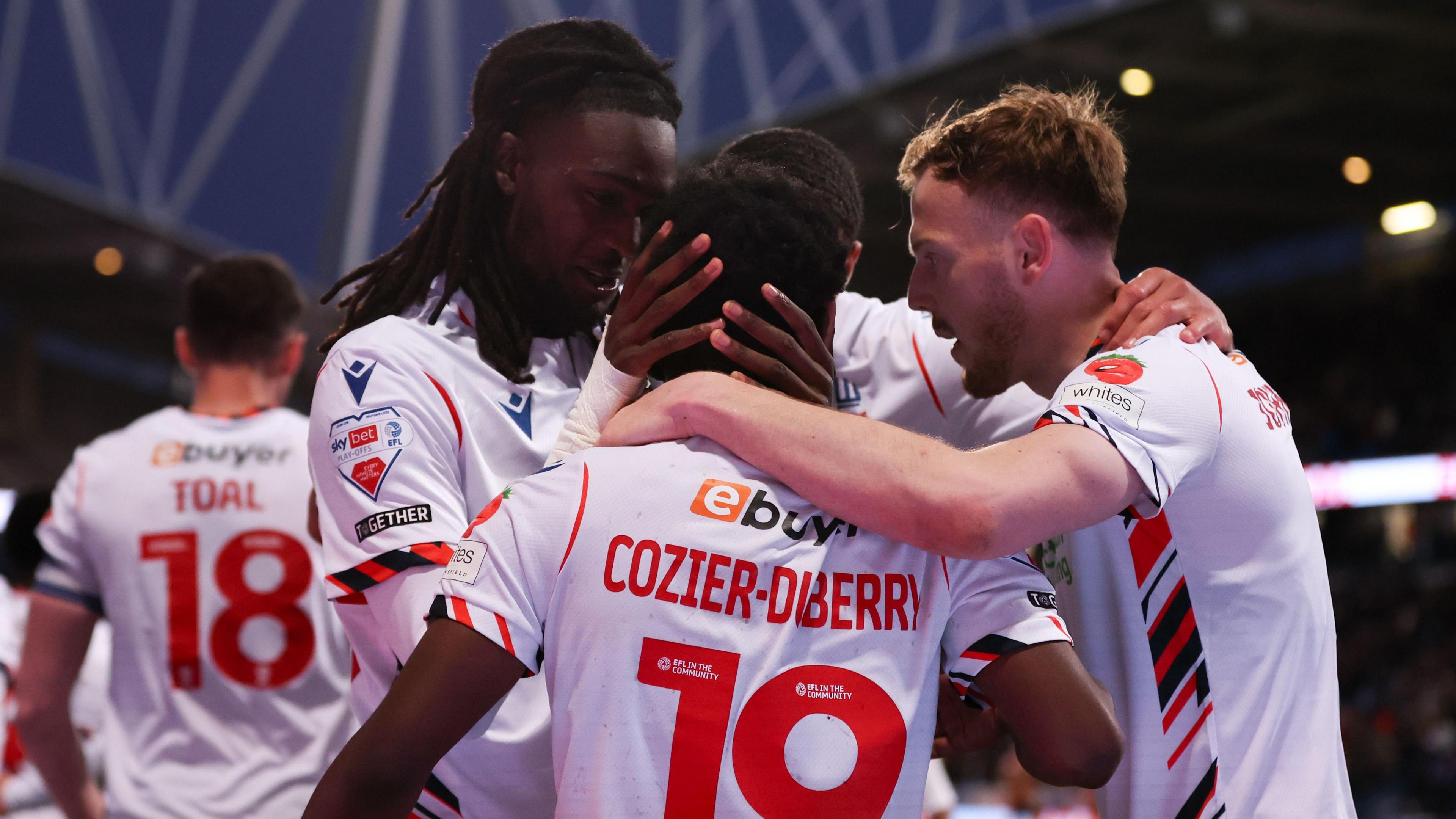 Bolton celebrate Amario Cozier-Duberry's goal against Bradford