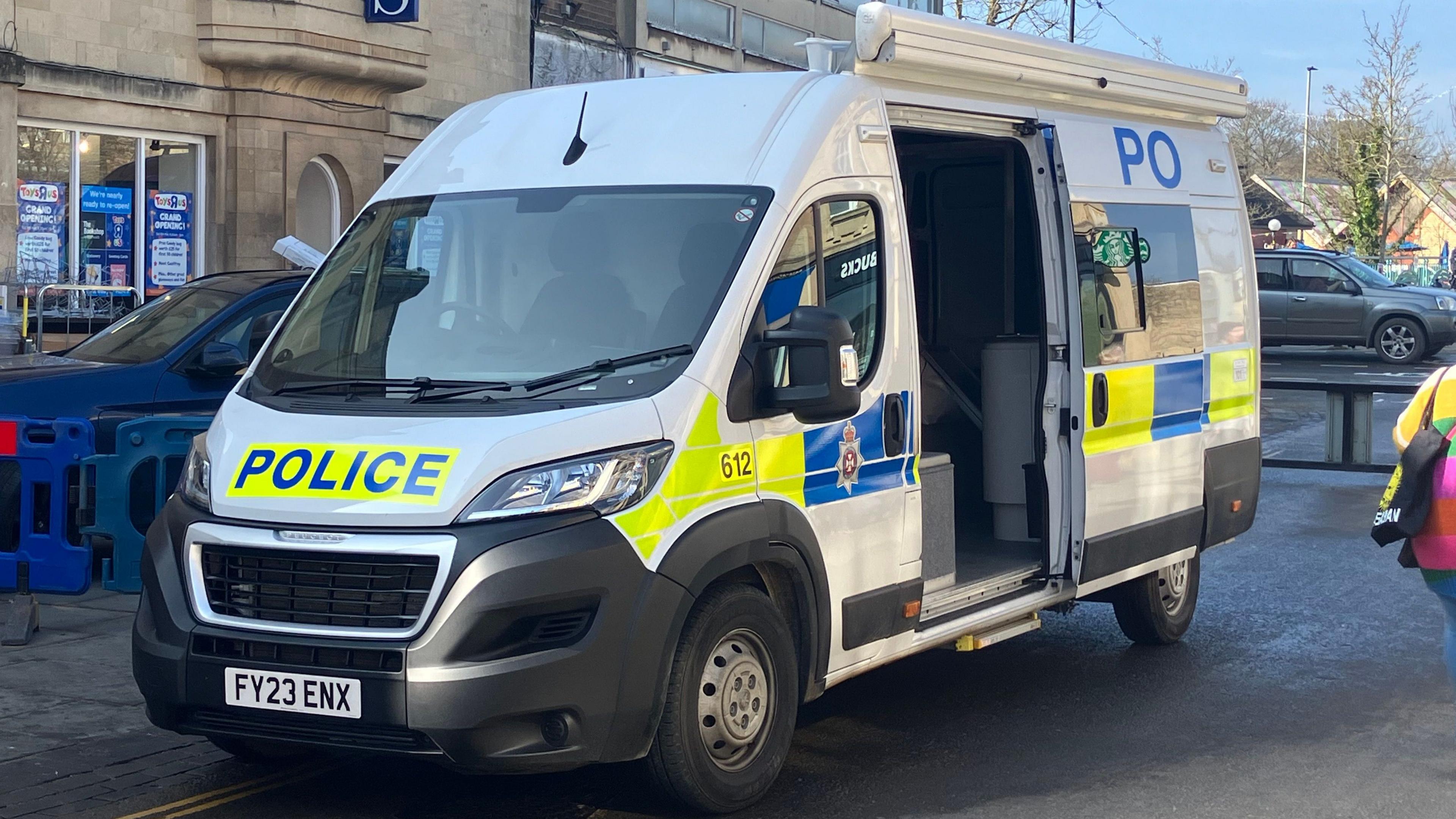 A police van outside the Black Horse Pub.