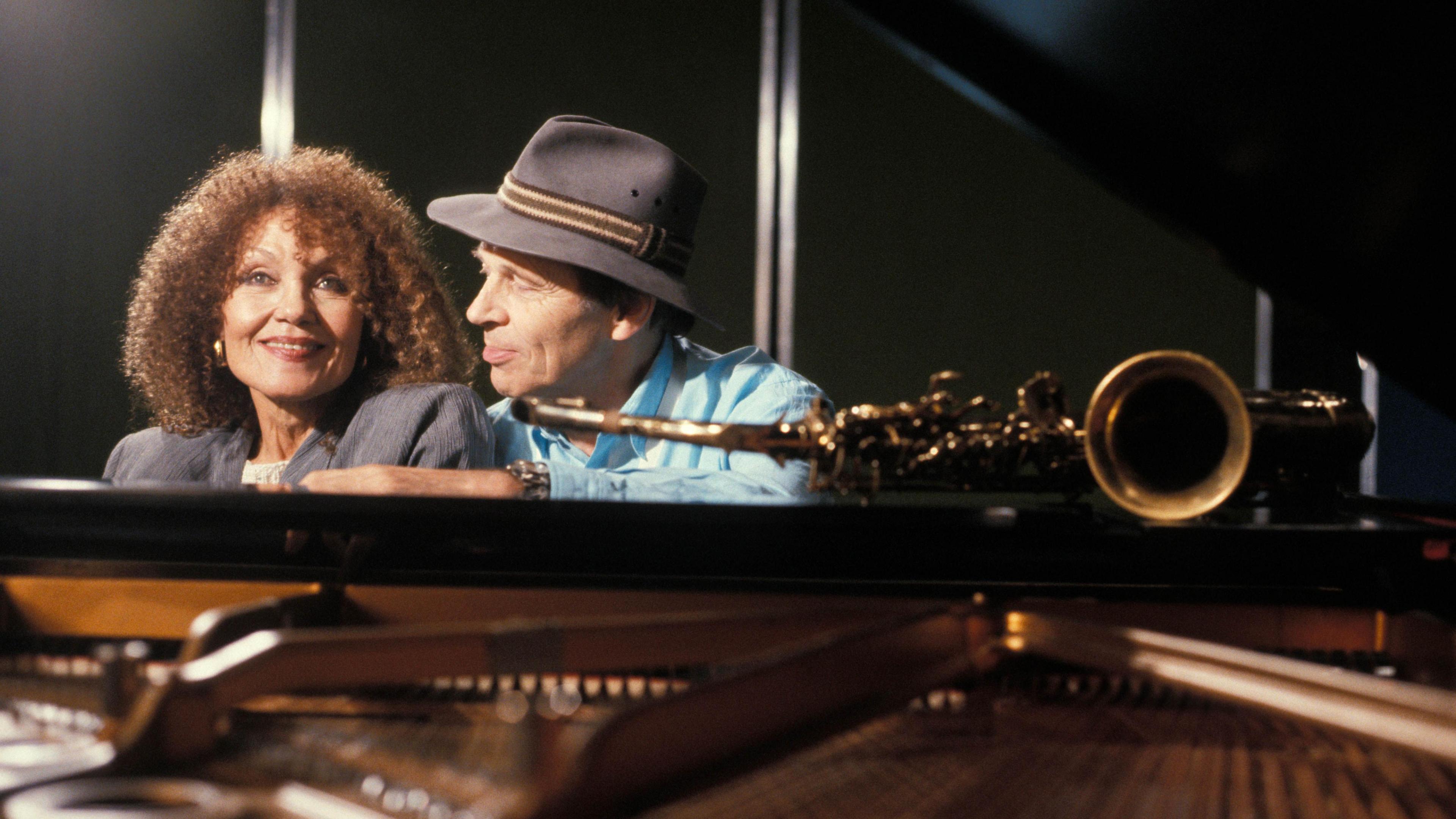 Dame Cleo Laine and her husband Sir John Dankworth at the piano