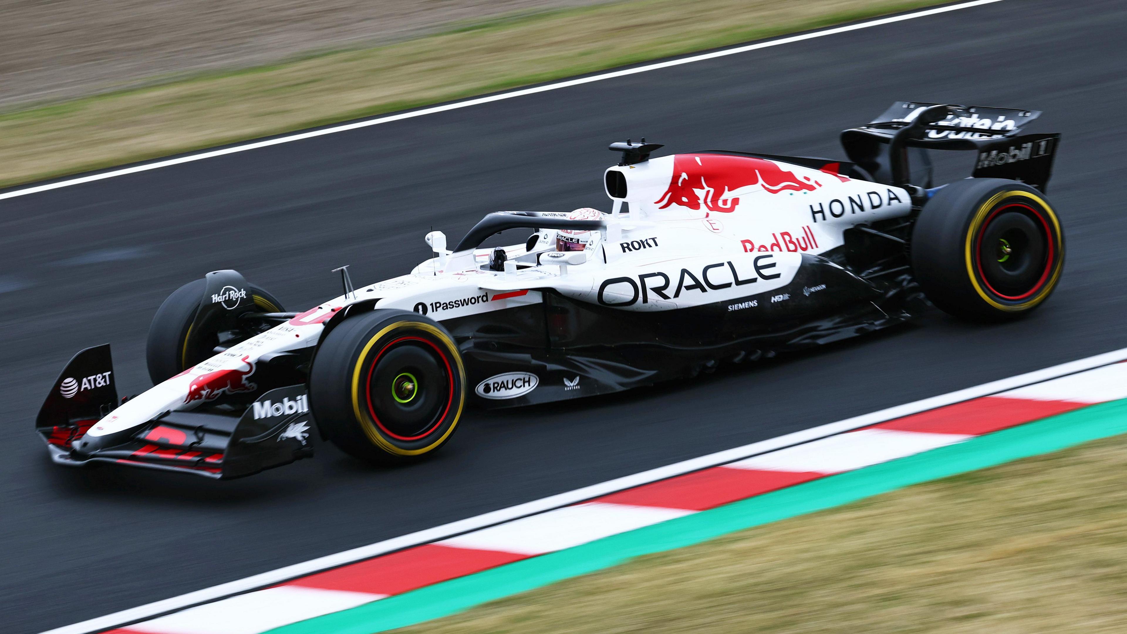 Max Verstappen drives the RB21 Red Bull in a white livery paying tribute during Honda during the 2025 Japanese Grand Prix