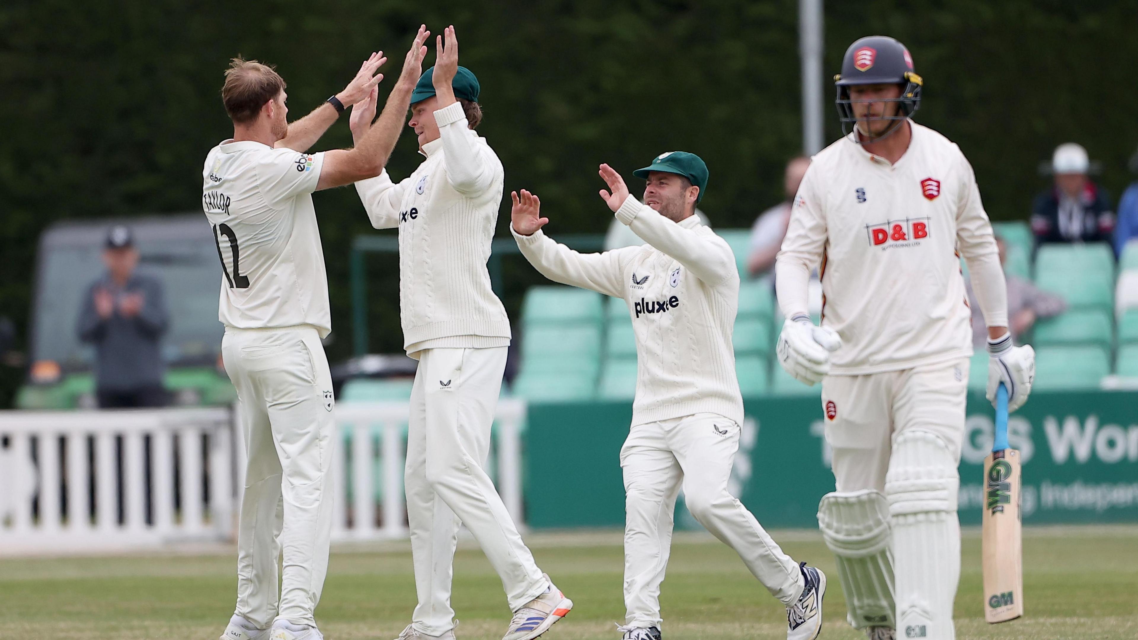 Tom Taylor celebrating with team-mates