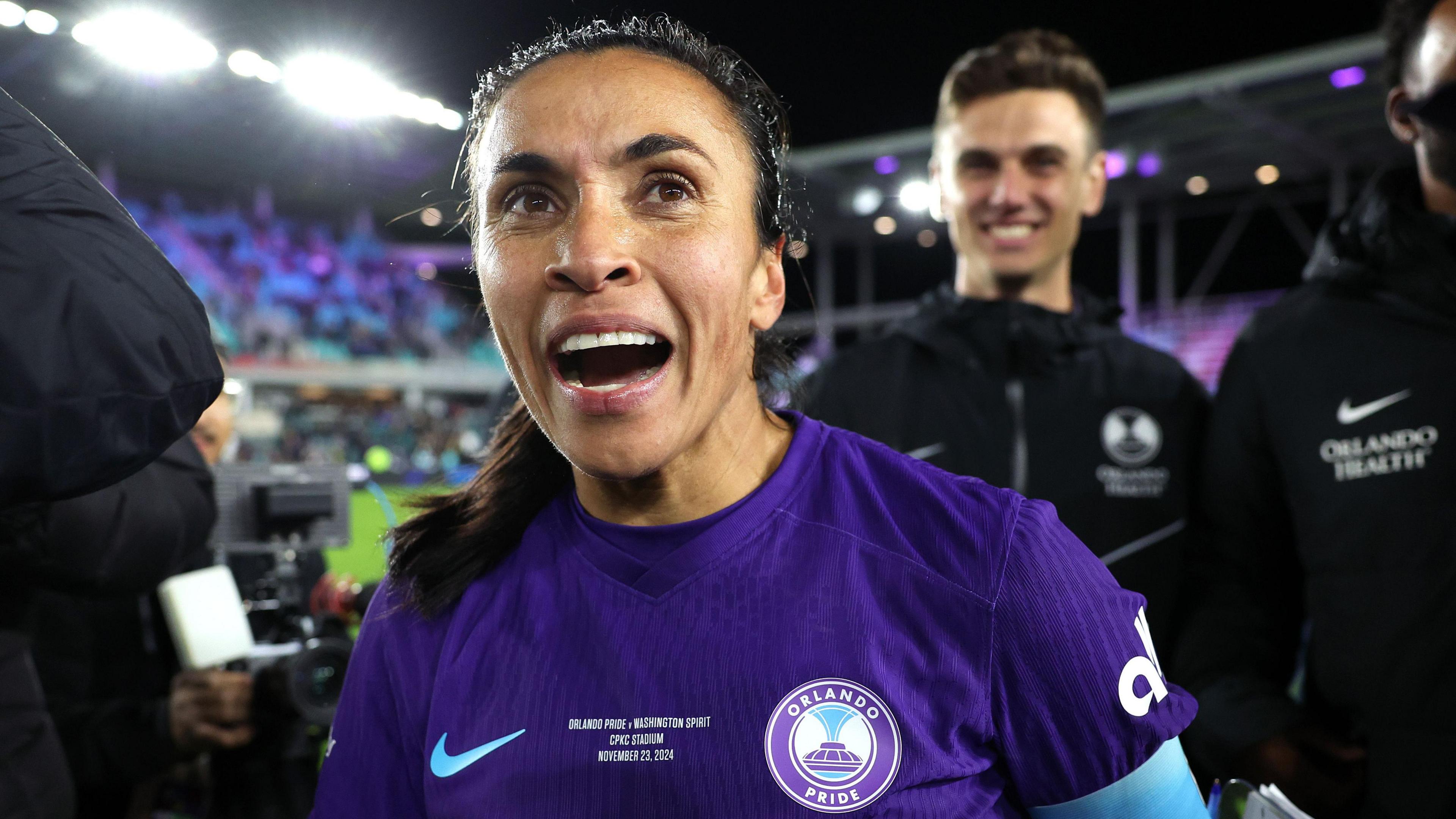 Marta wearing an Orlando Pride kit