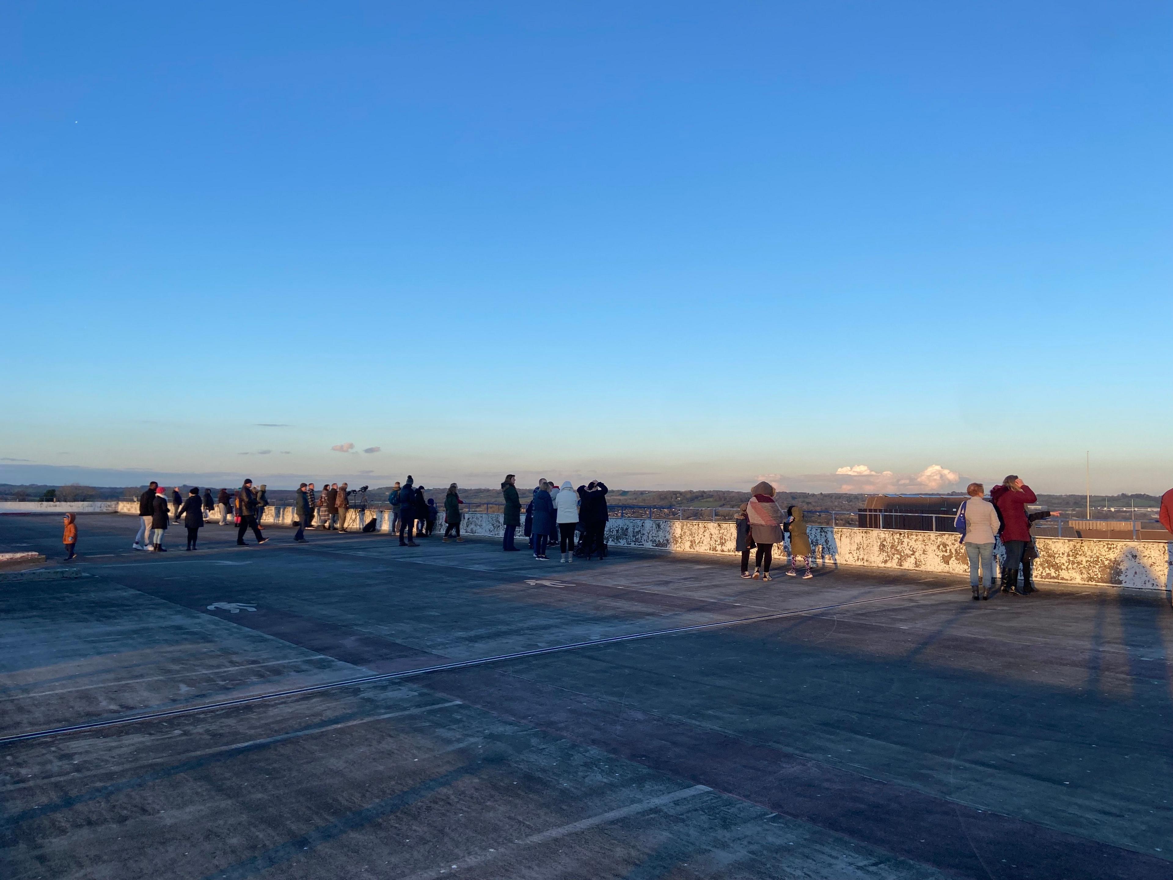 Crowds await the murmuration from the roof of the Kingfisher Shopping Centre car park