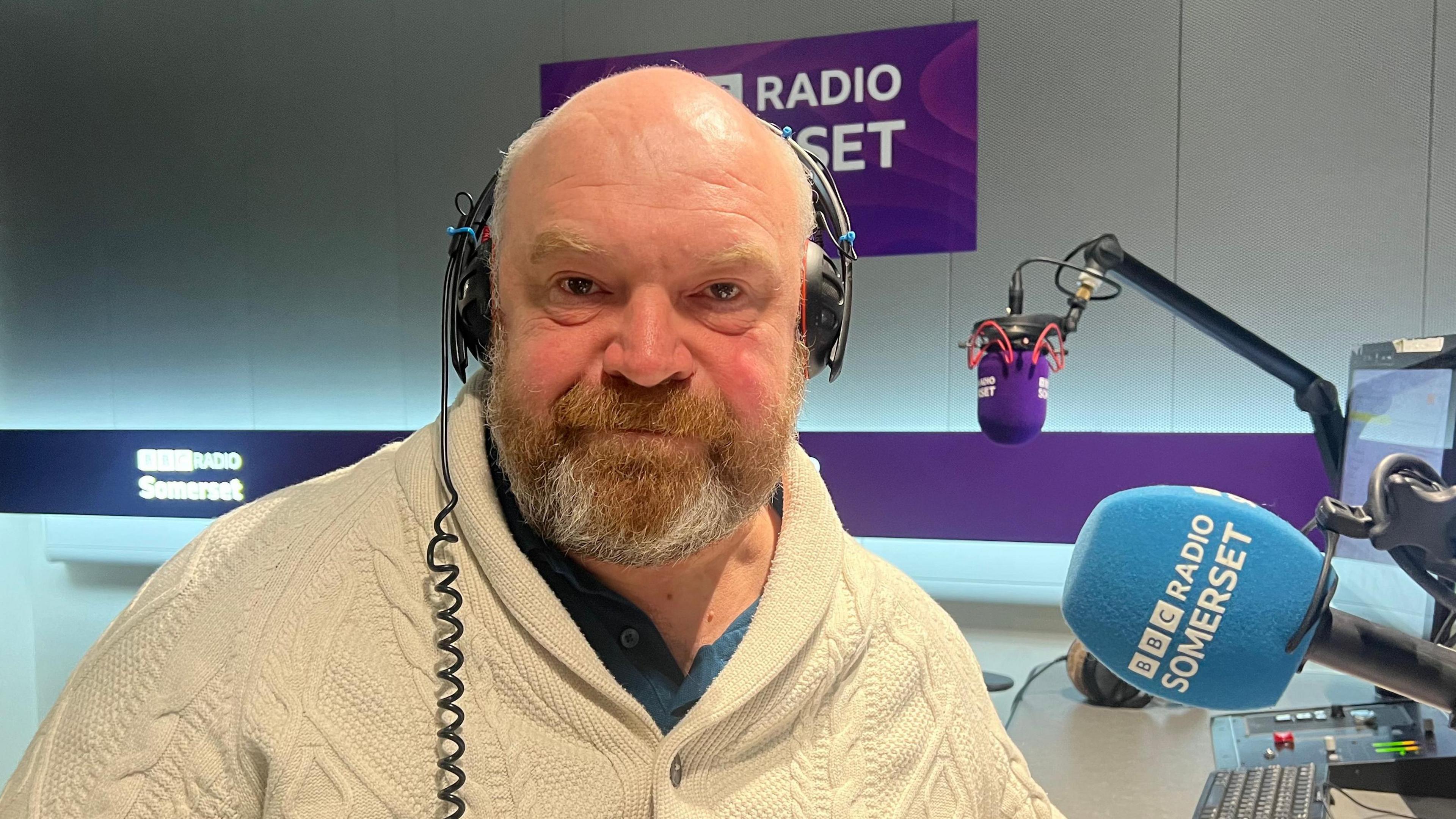 Somerset Council leader Cllr Bill Revans sitting in a radio studio