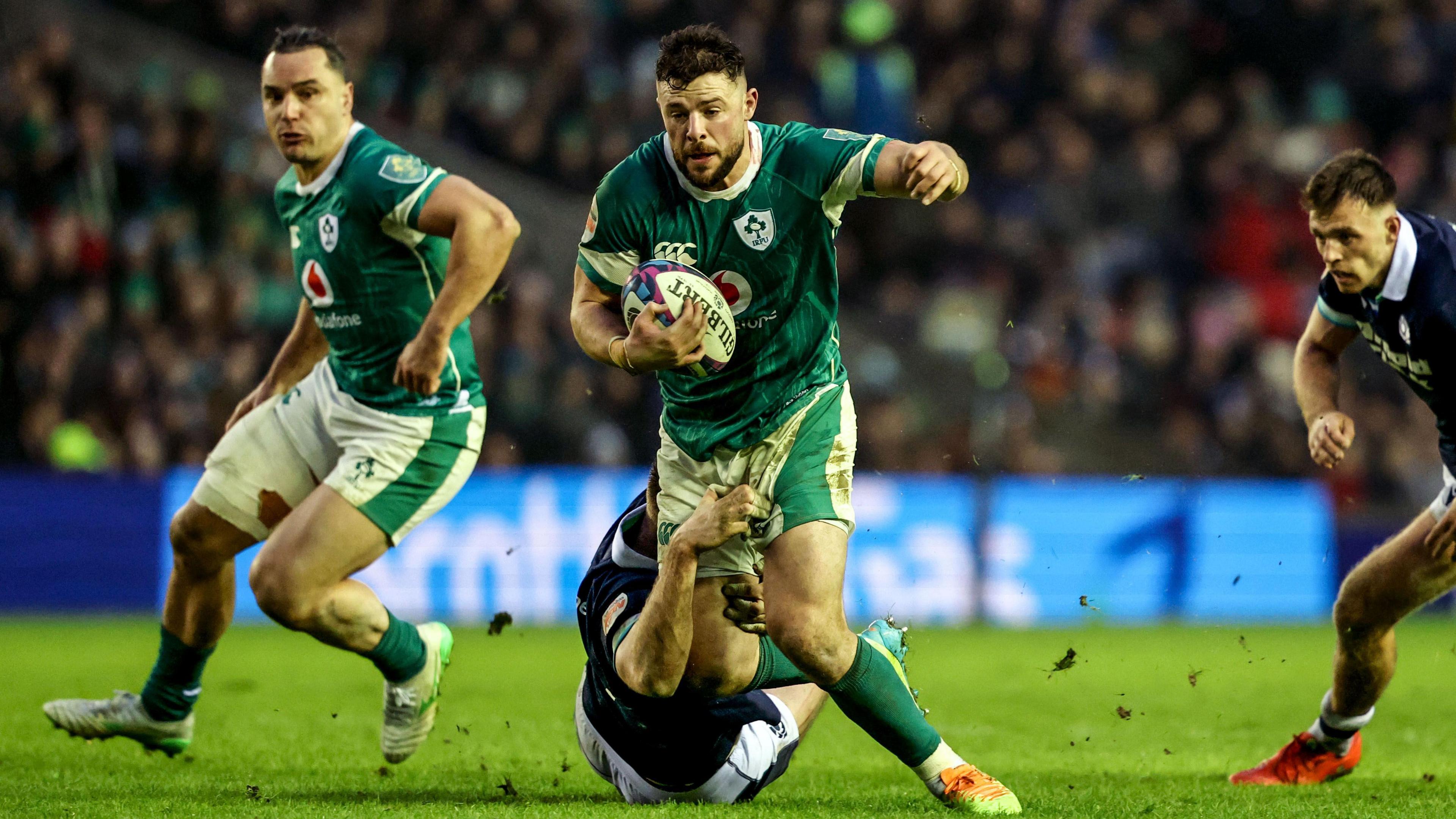 Robbie Henshaw carries the ball against Scotland