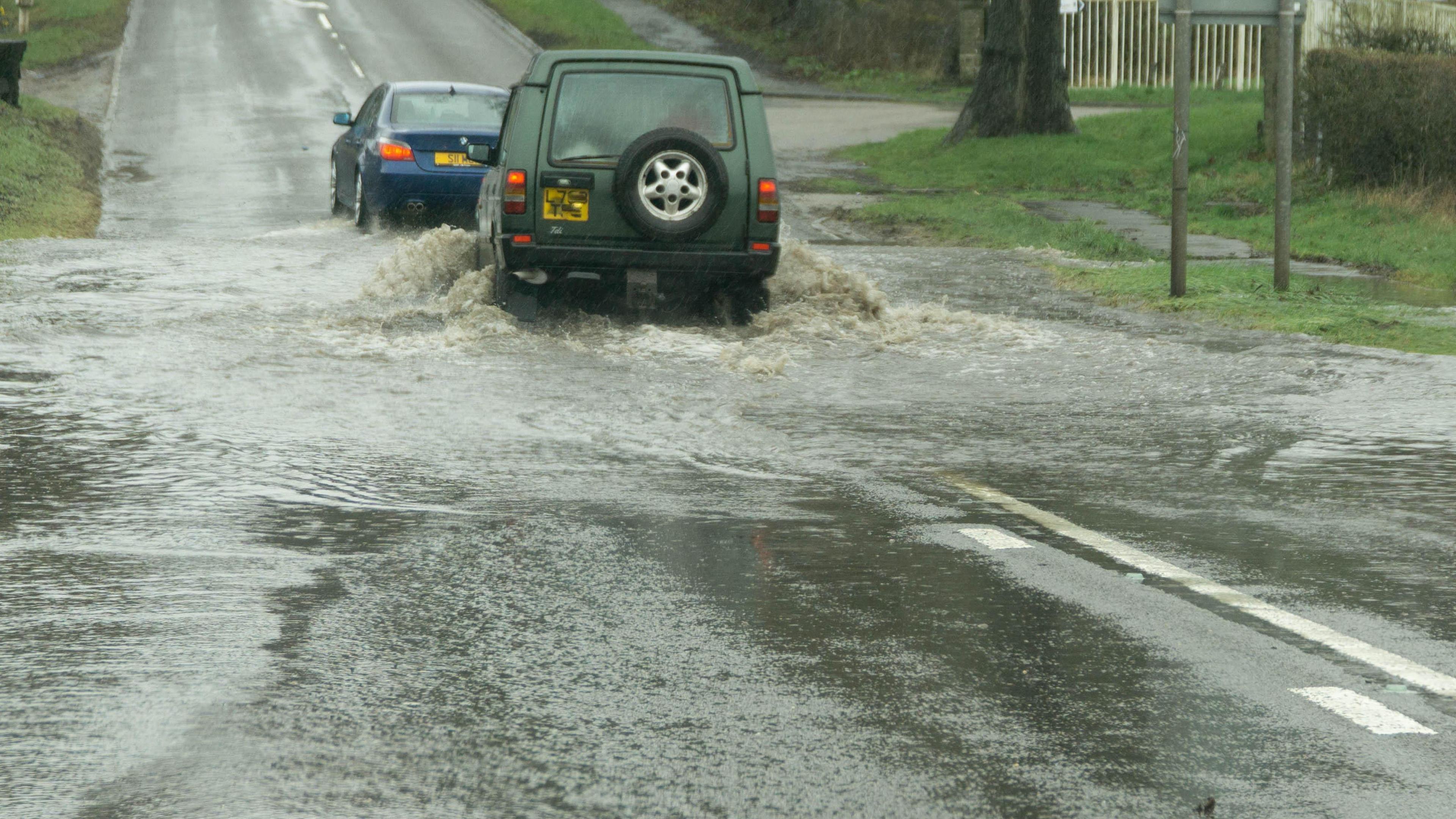 Cars in puddles