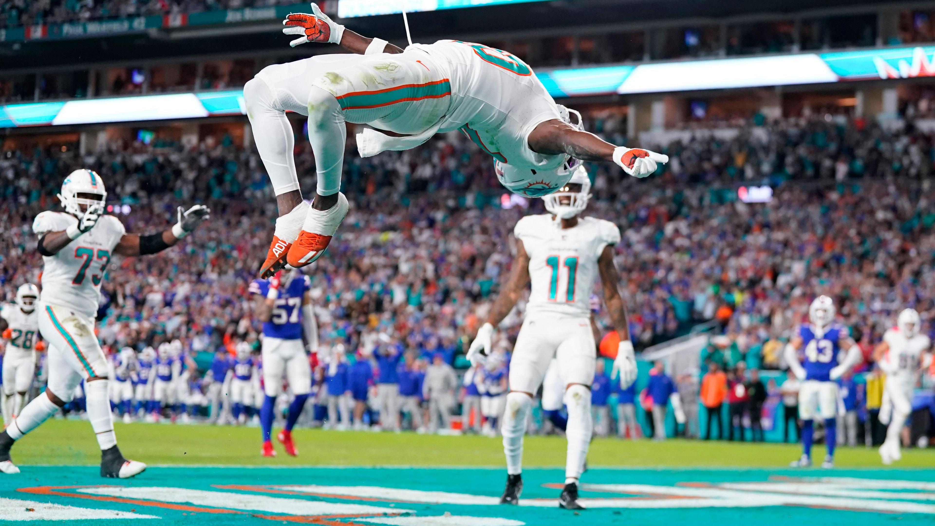 Tyreek Hill celebrates with a back flip