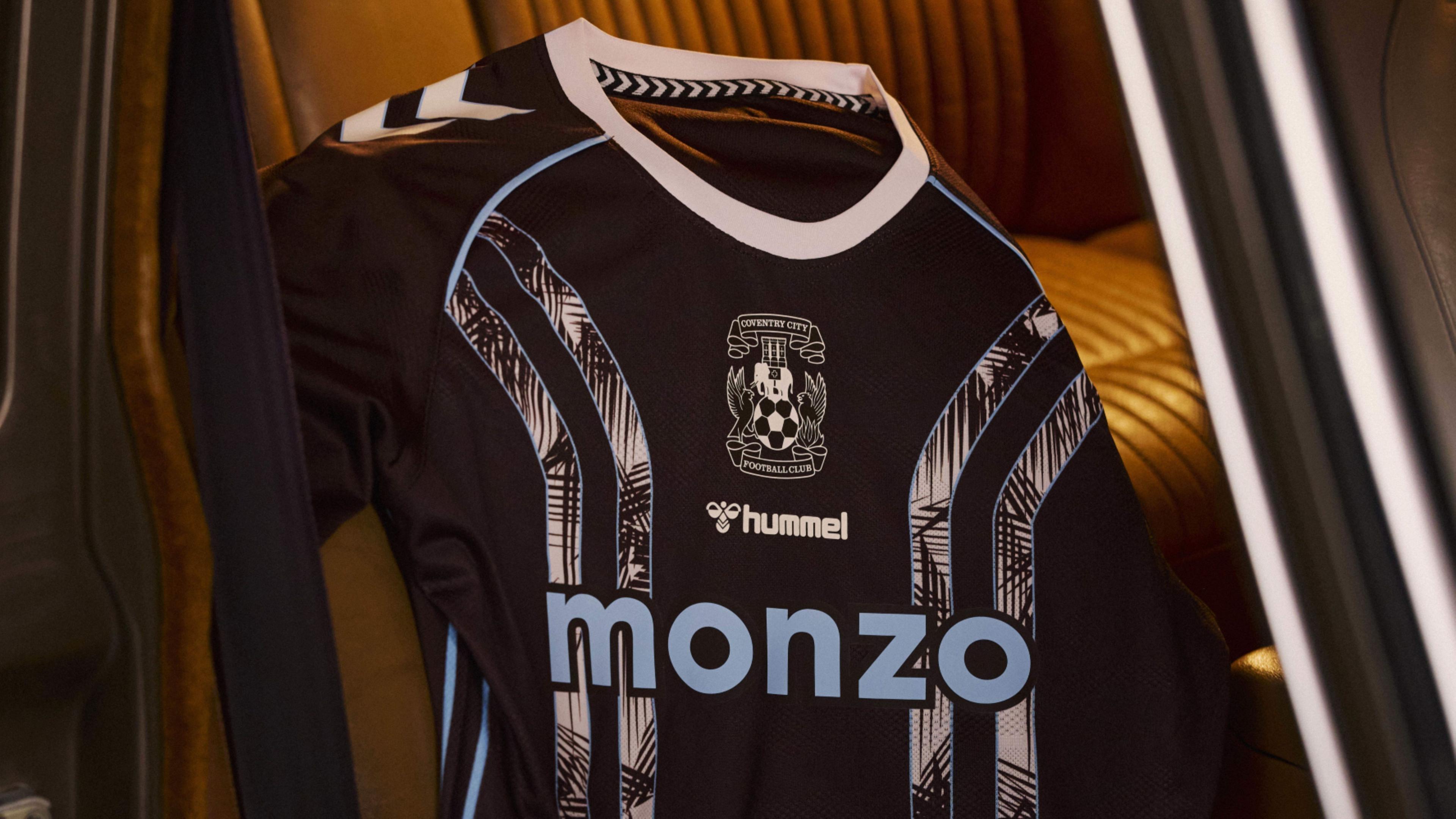 Coventry City's new Hummel kit, in deep chocolate-plum with sky blue features.